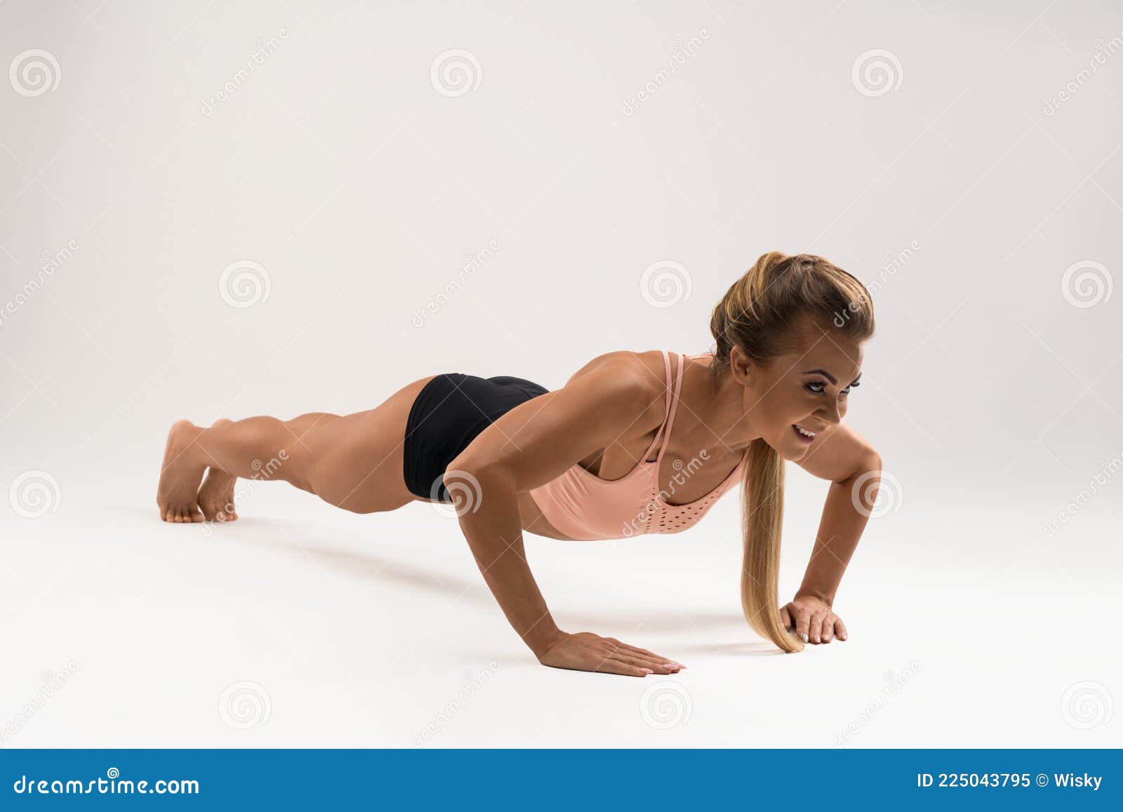 Beautiful Young Sports Lady Doing Push Ups While Workout At Home Stock  Photo - Download Image Now - iStock