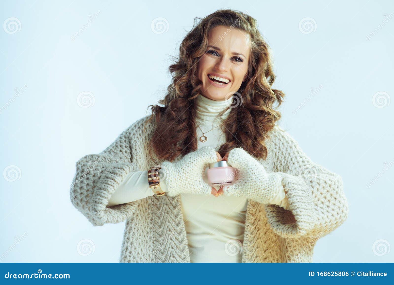 Woman Showing Winter Skin Care Creme in Heart Shaped Hands Stock Photo ...