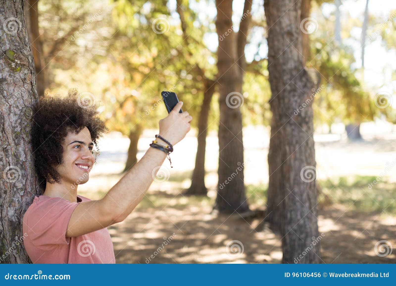 Smiling Taking Selfie at Forest Stock Photo Image of growth, hair