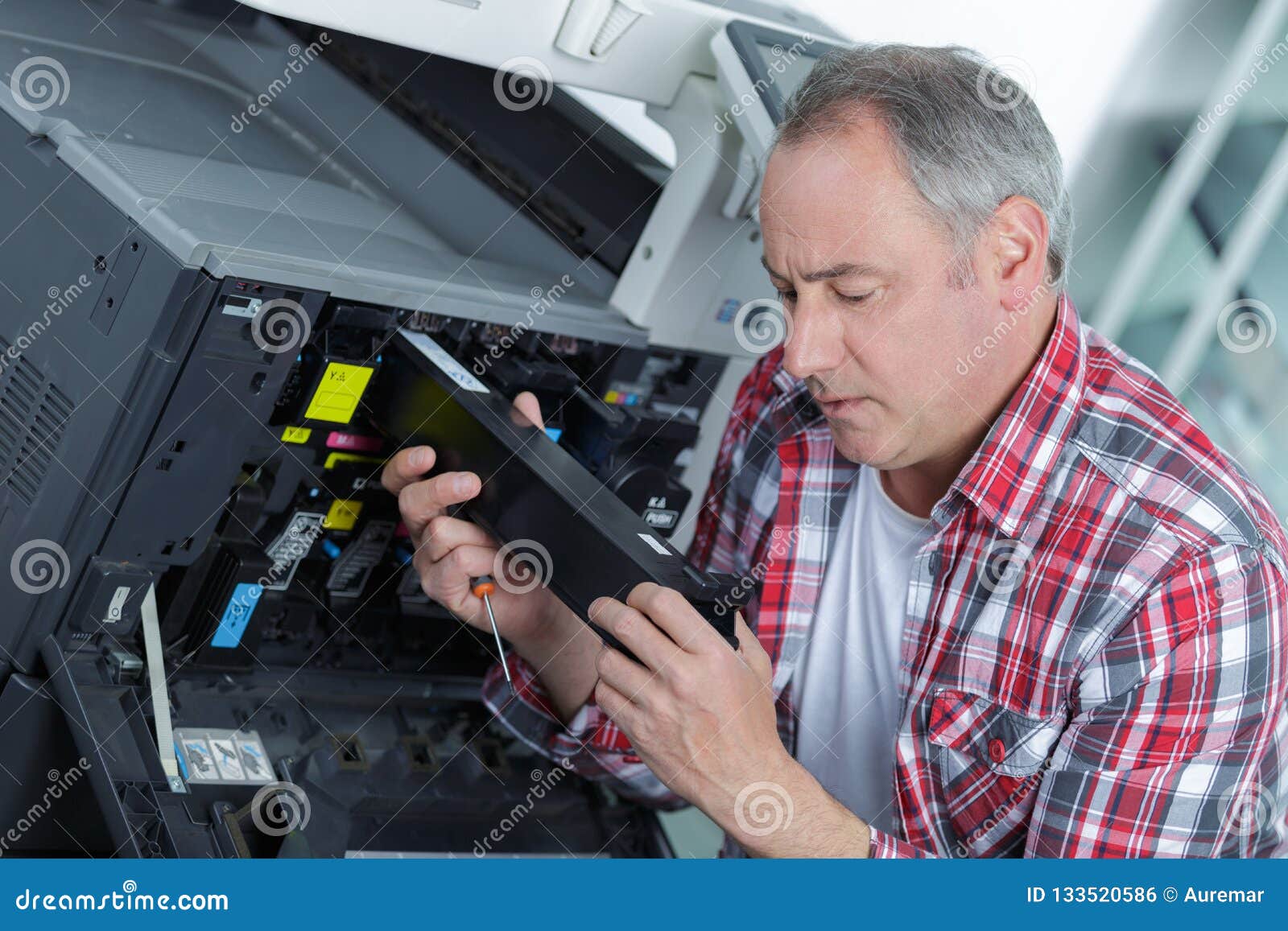 Smiling Technician Sitting Near Copier Stock Photo Image of