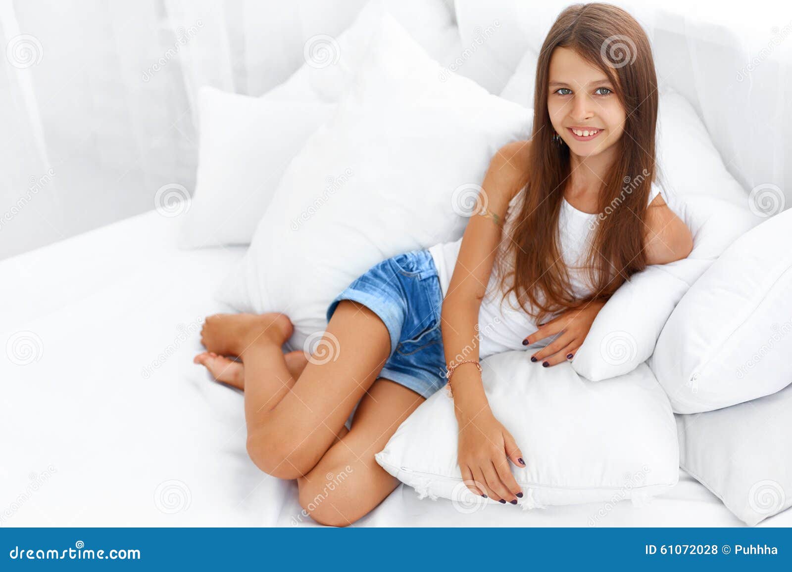 Very Young Teen Girl On The Bed