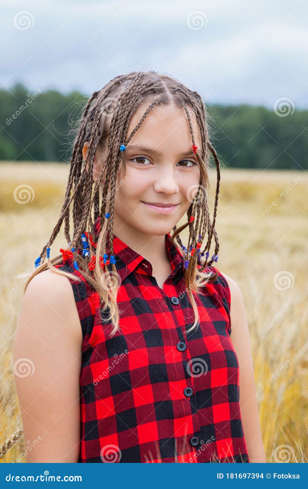 Happy Young Fashionable Teenager Girl Lying In A Wheat 