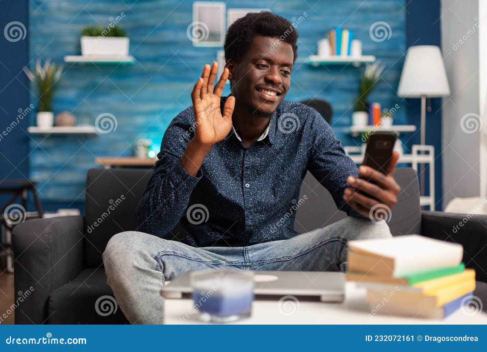 smiling teenager greeting remote collegue discussing marketing ideas