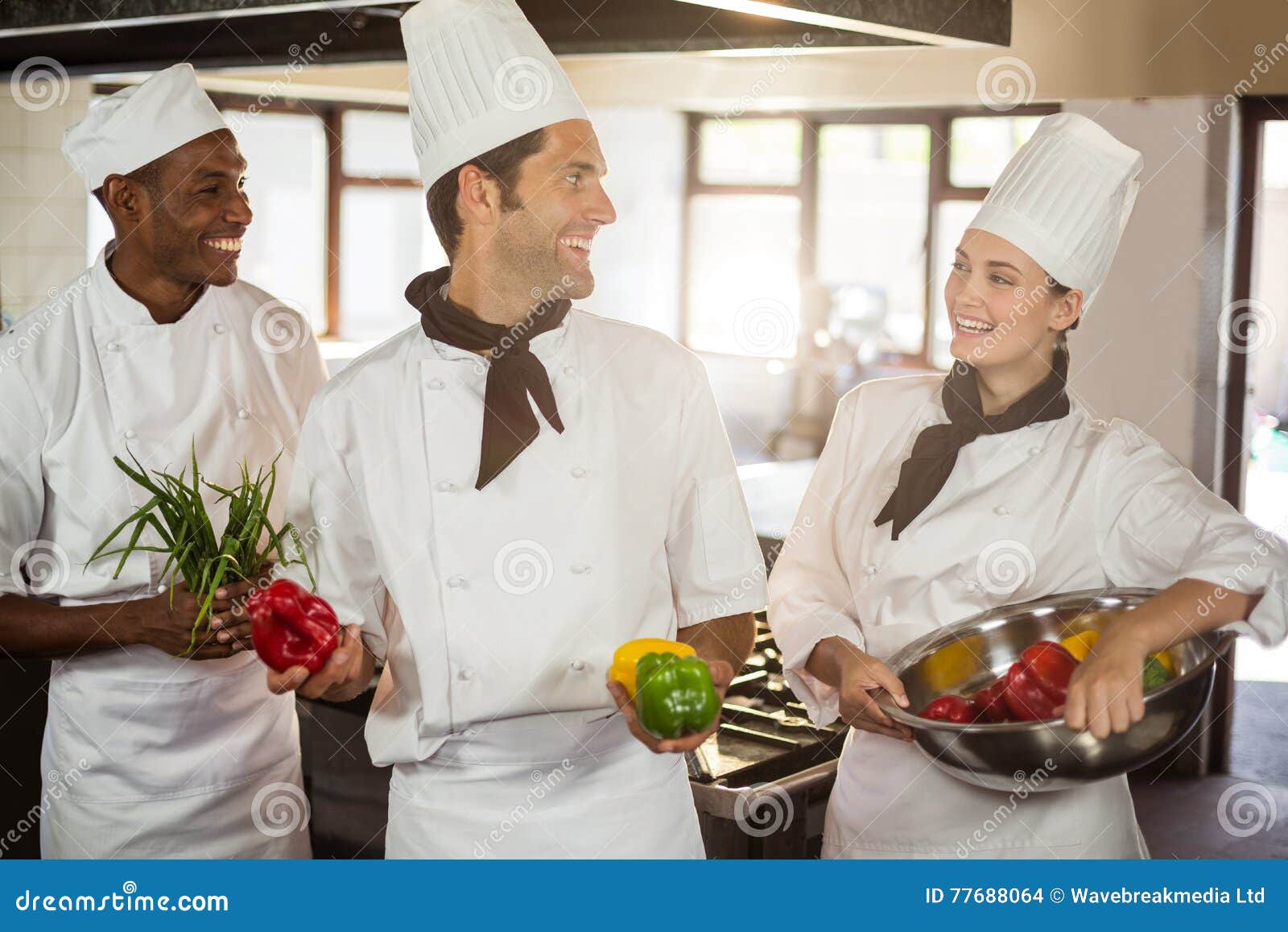 Smiling Three Chefs Holding a Vegetables Stock Photo Image of hotel