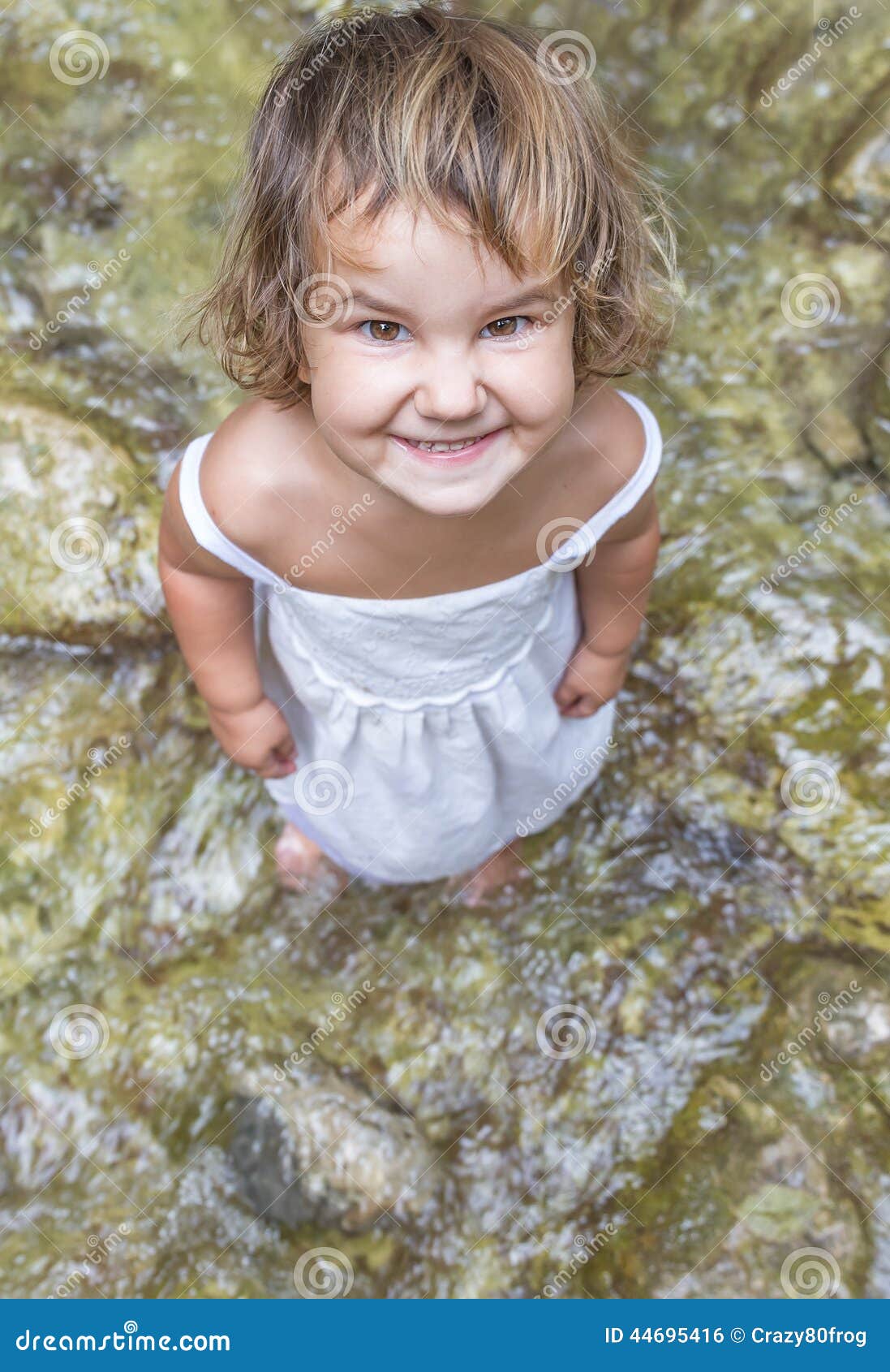 Smiling Toddler Child Girl On Waterfall Background Stock Photo - Image ...