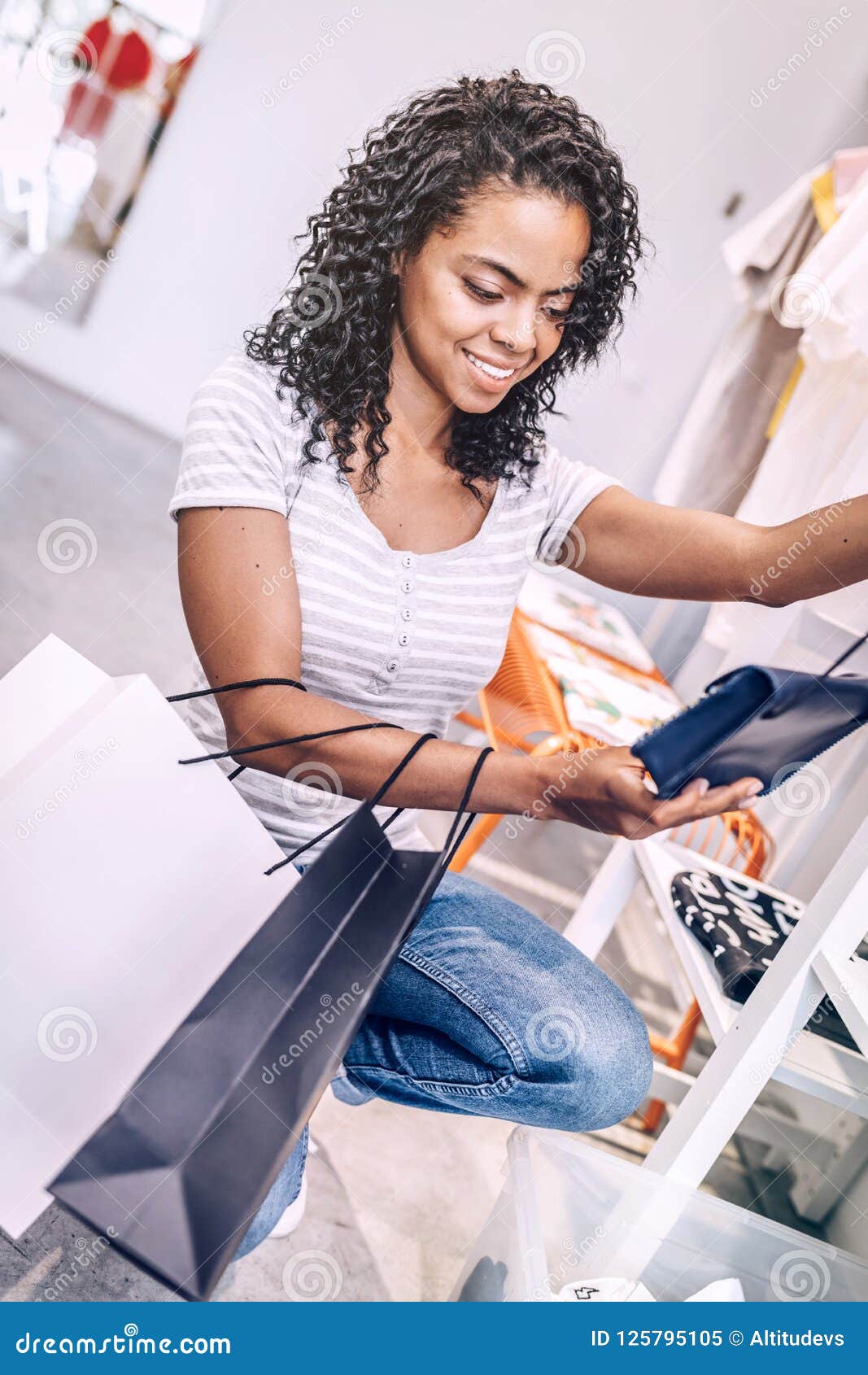 Smiling Woman Buying New Clutch Stock Image - Image of clutch ...