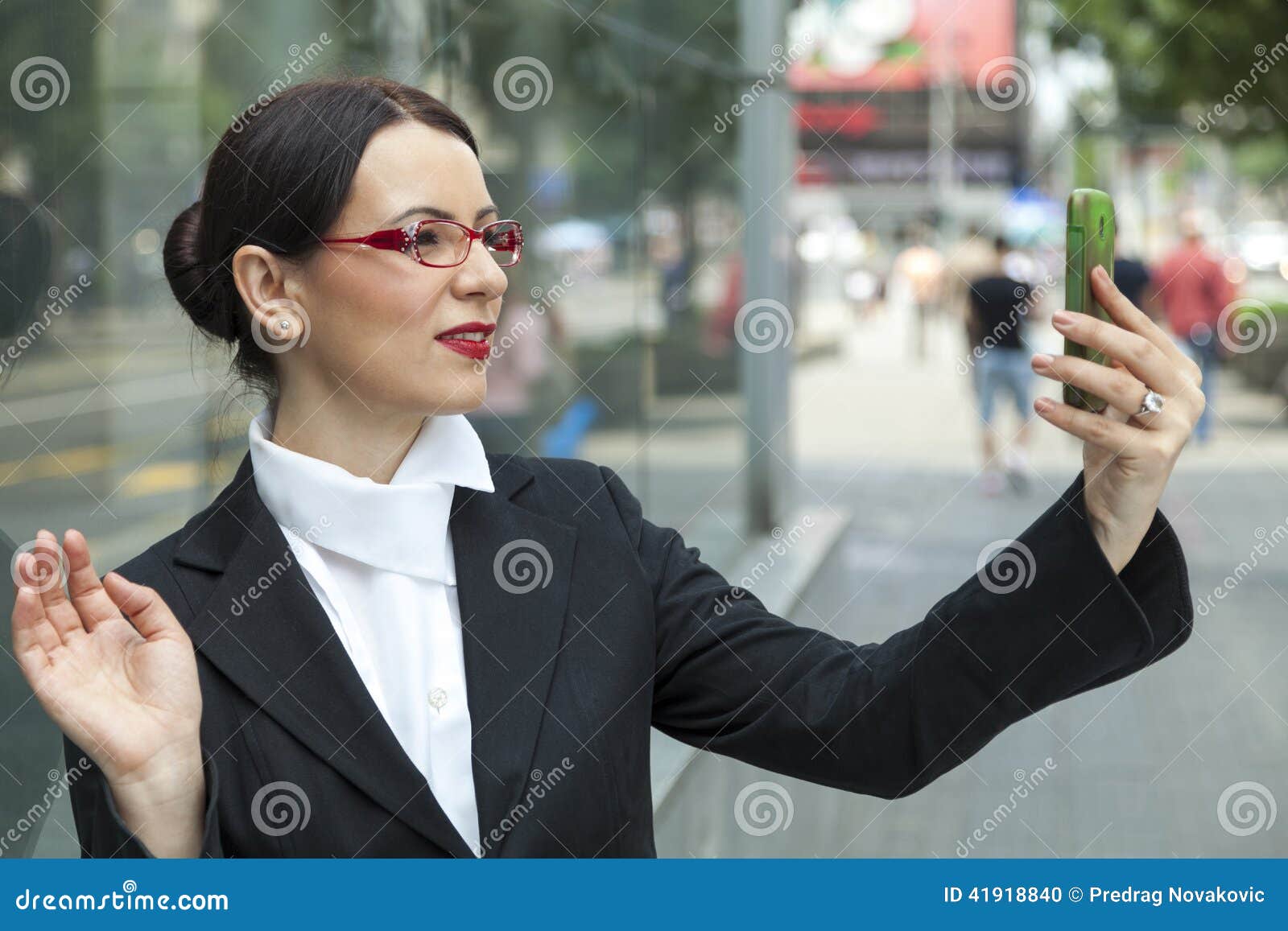 smiling woman capturing a self shot