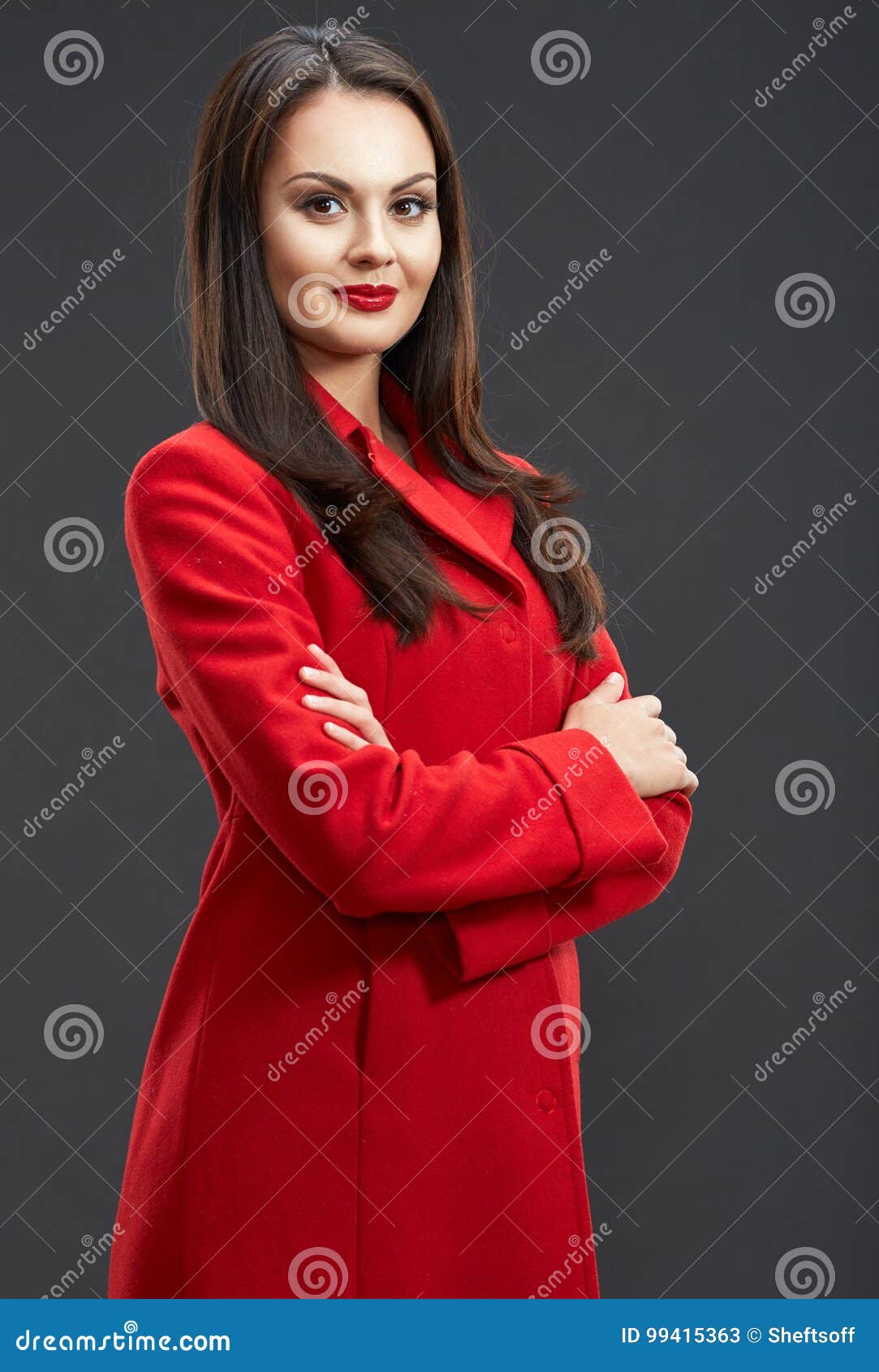 Smiling Woman Dressed in Red Coat Standing with Crossed Arms. Stock ...