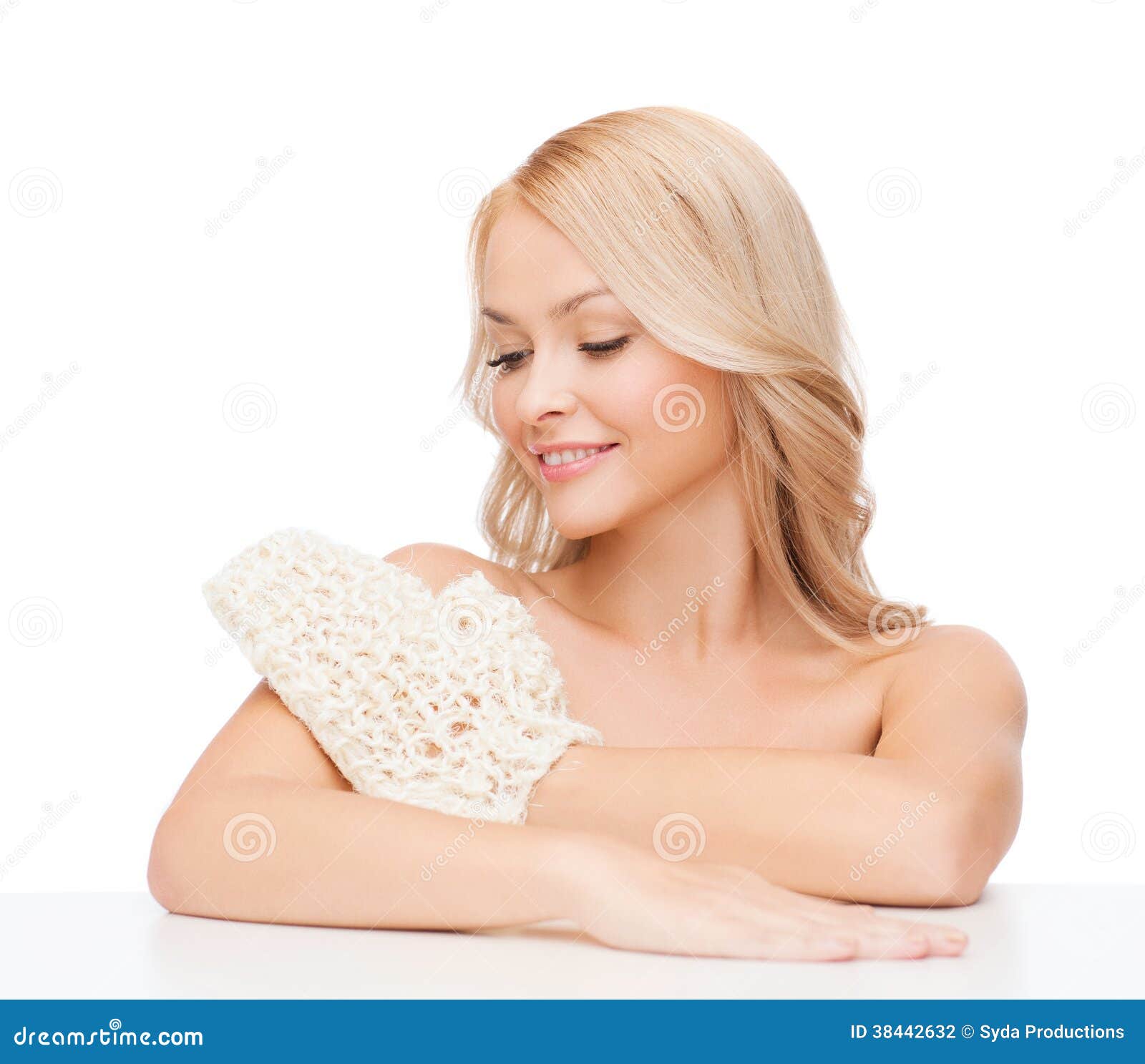 smiling woman with exfoliation glove