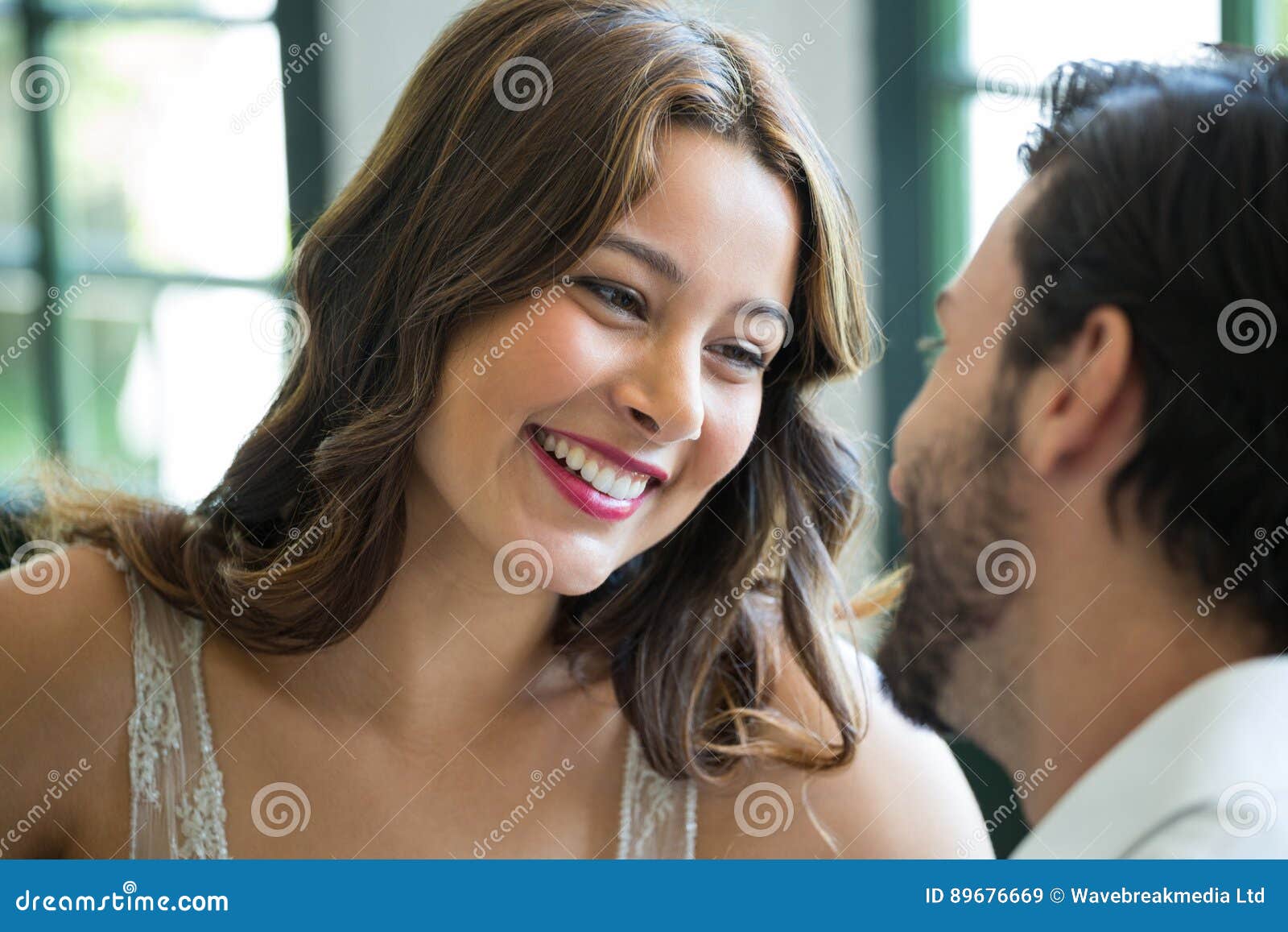 Smiling Woman Looking at Man in Restaurant Stock Image  Image of