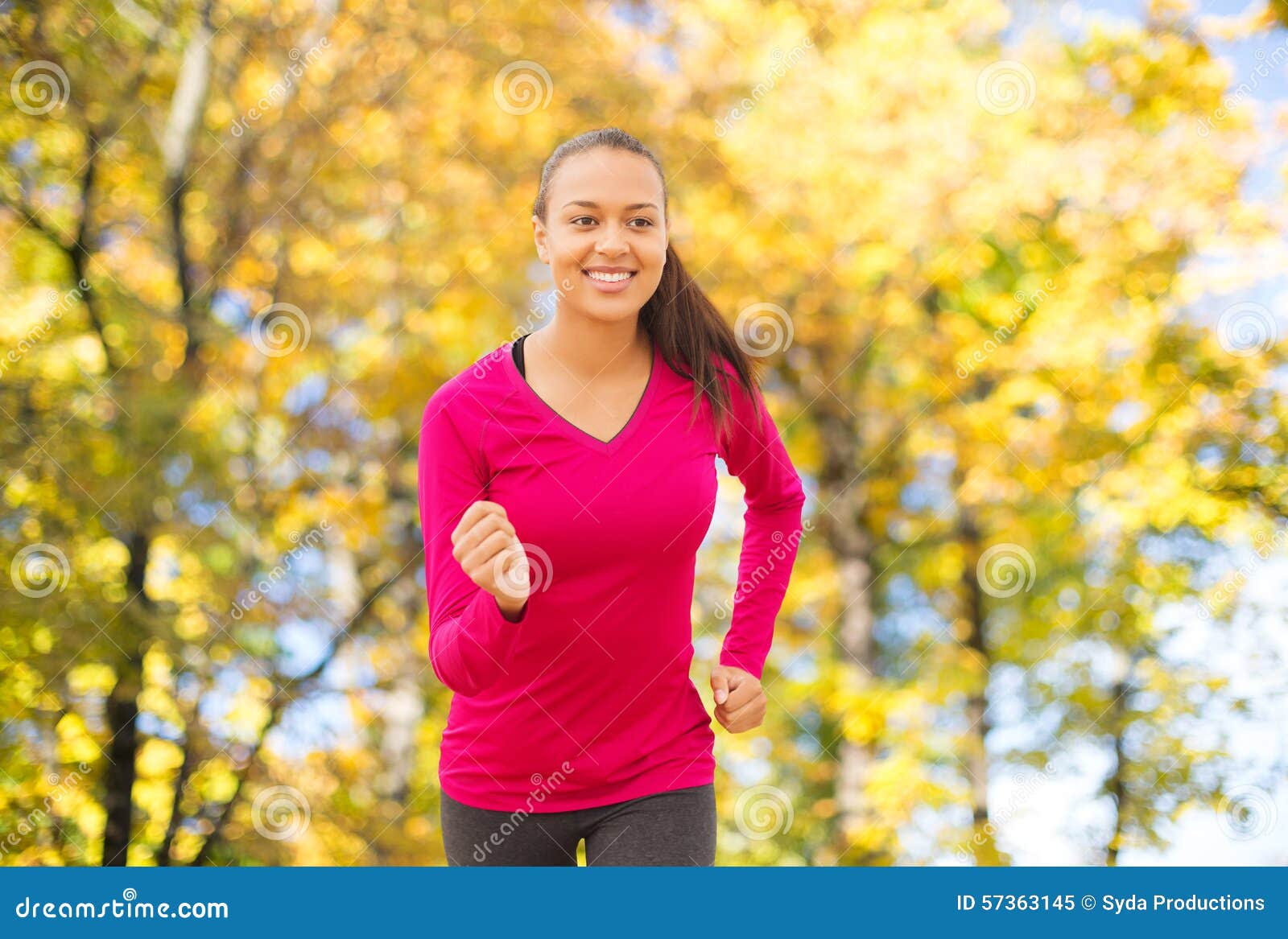 Smiling Woman Running Outdoors at Autumn Stock Image - Image of autumn ...