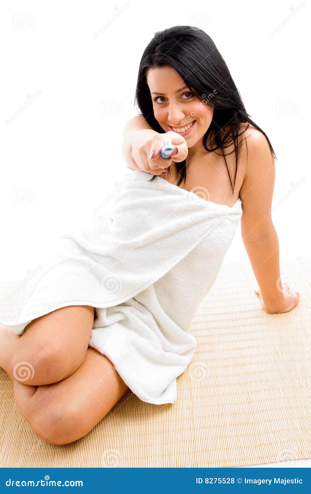 smiling woman scrubbing her body