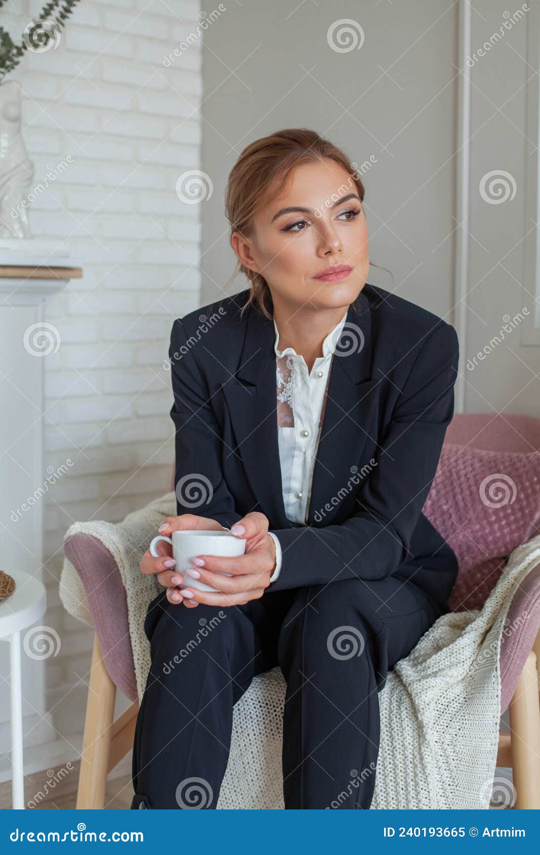 Smiling Woman Sitting on Armchair and Drinking Coffee Stock Image ...