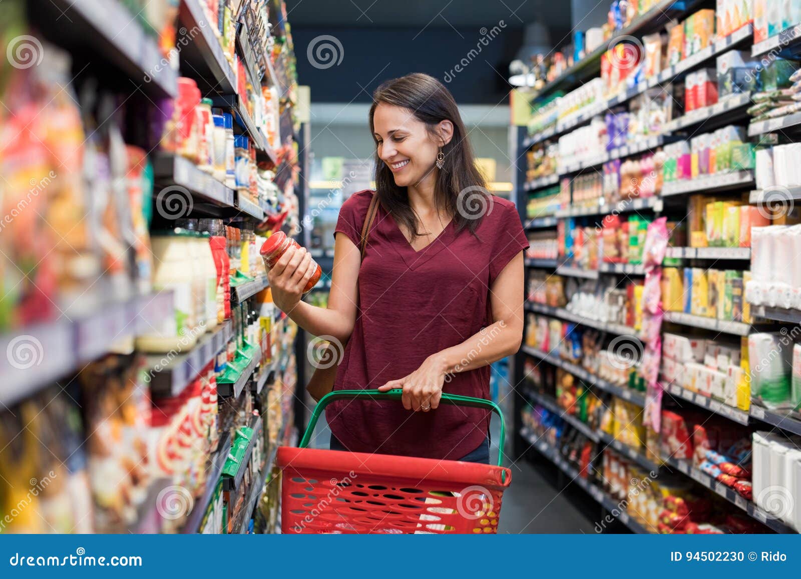 smiling woman at supermarket