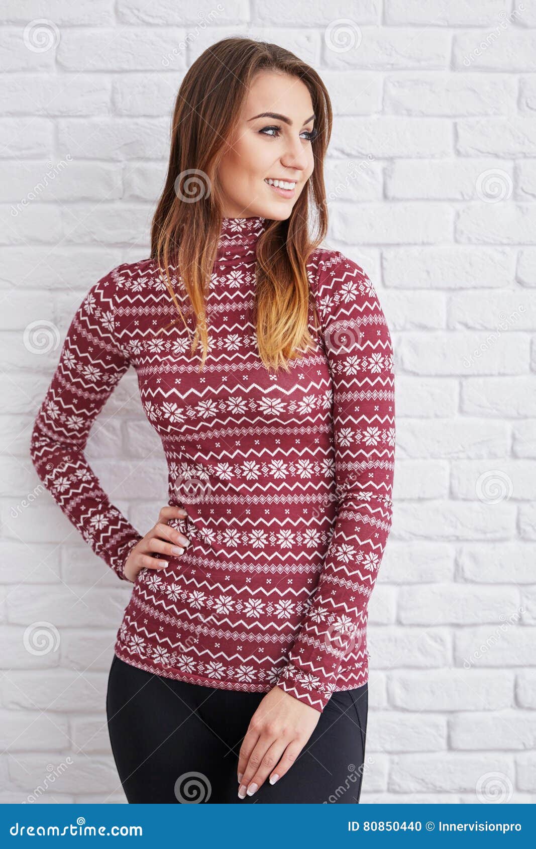 smiling woman wearing warm sweater