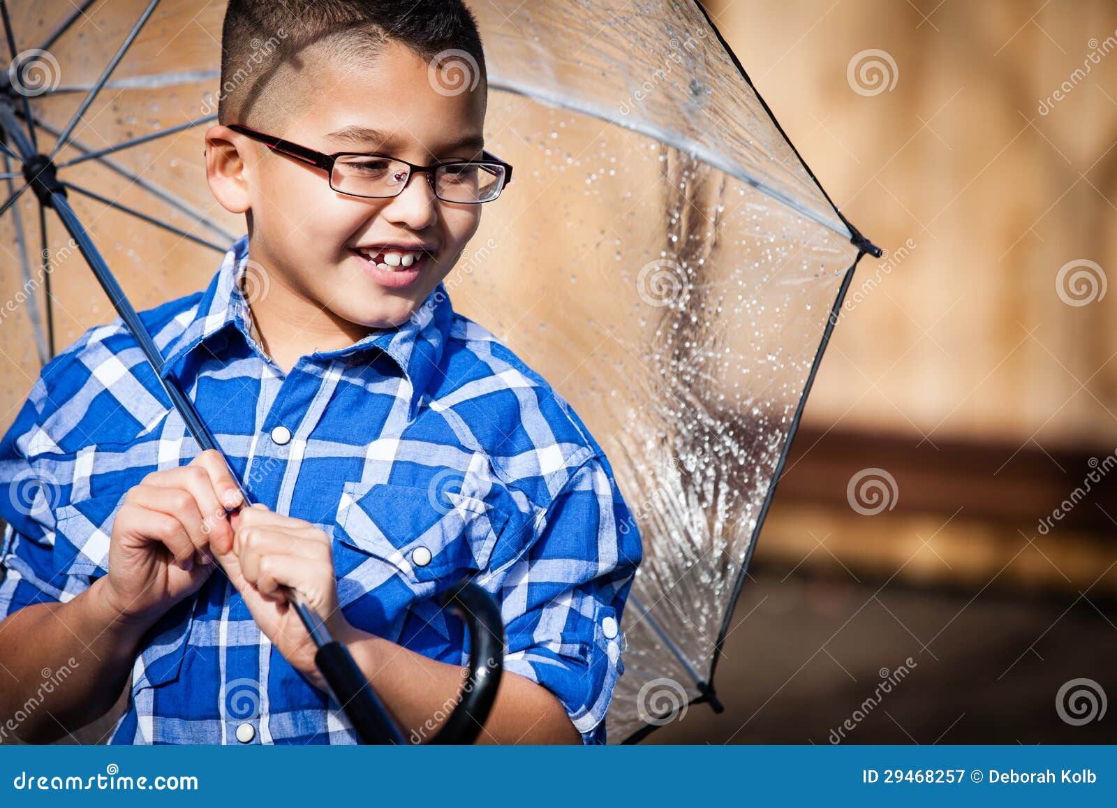 Smiling Young Boy in the Rain with Umbrella Stock Image Image of