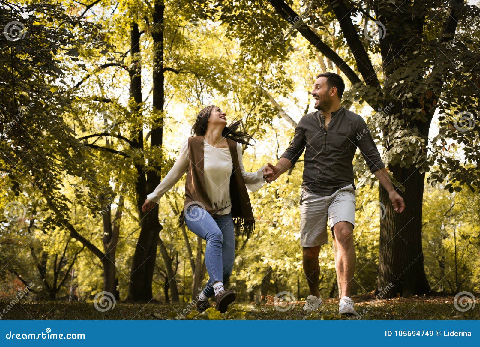 Smiling Young Couple Training Outside Together · Free Stock Photo