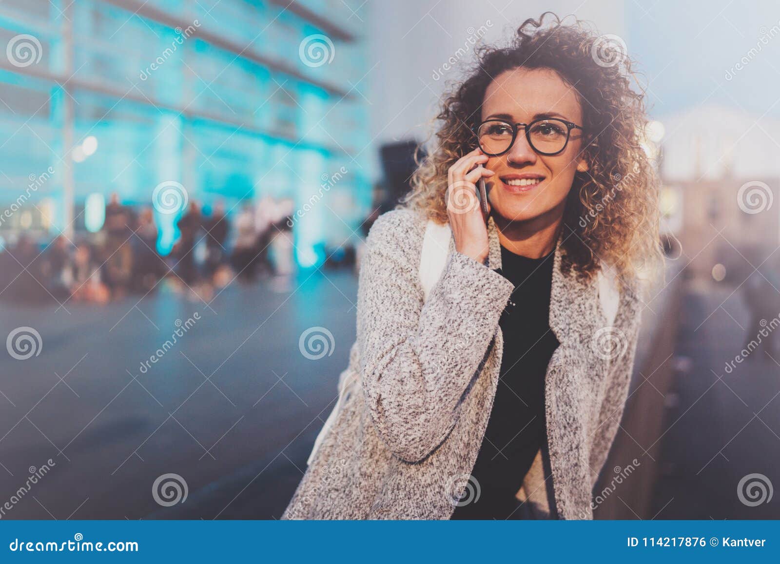 Smiling Young Girl Calling with Her Cell Telephone while Standing at ...