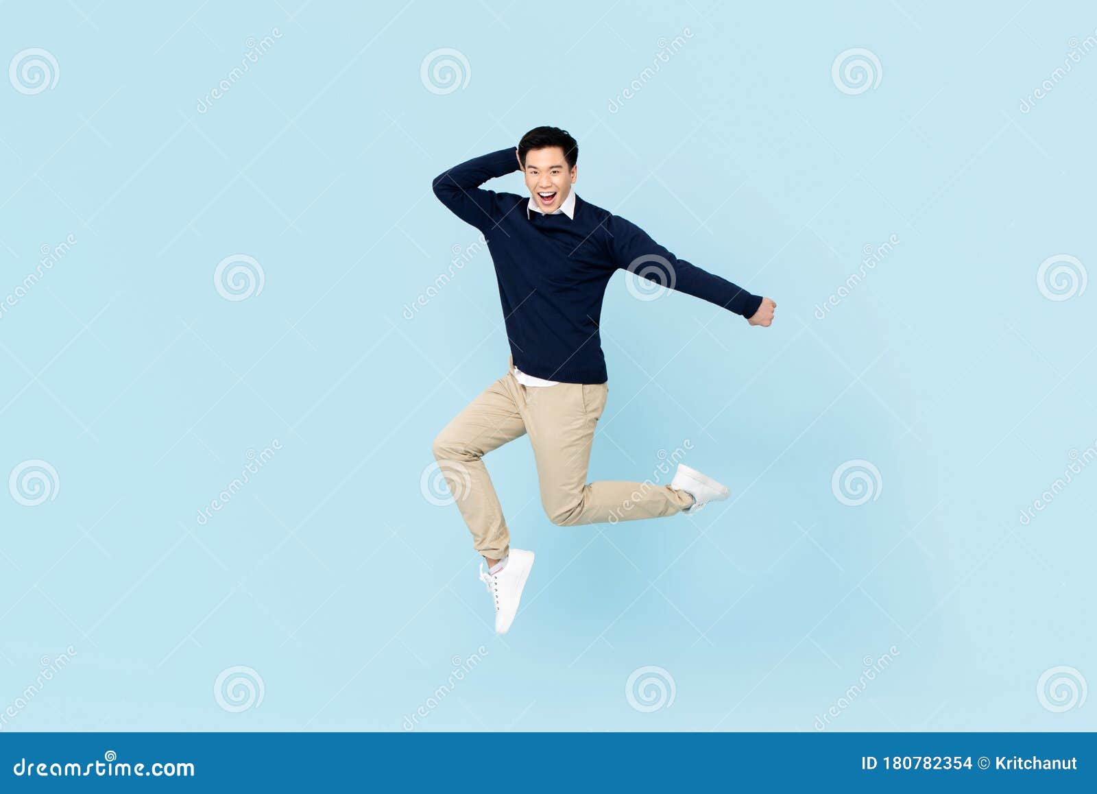 Smiling Young Handsome Asian Man Jumping Stock Photo - Image of ...
