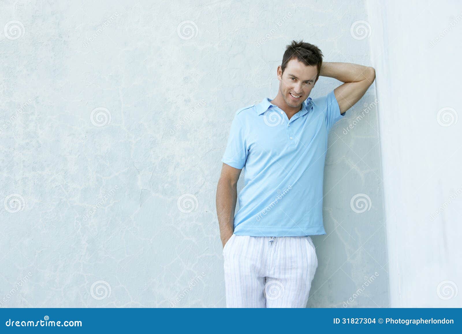 Smiling Young Man Leaning Against Wall Stock Photo Image of caucasian