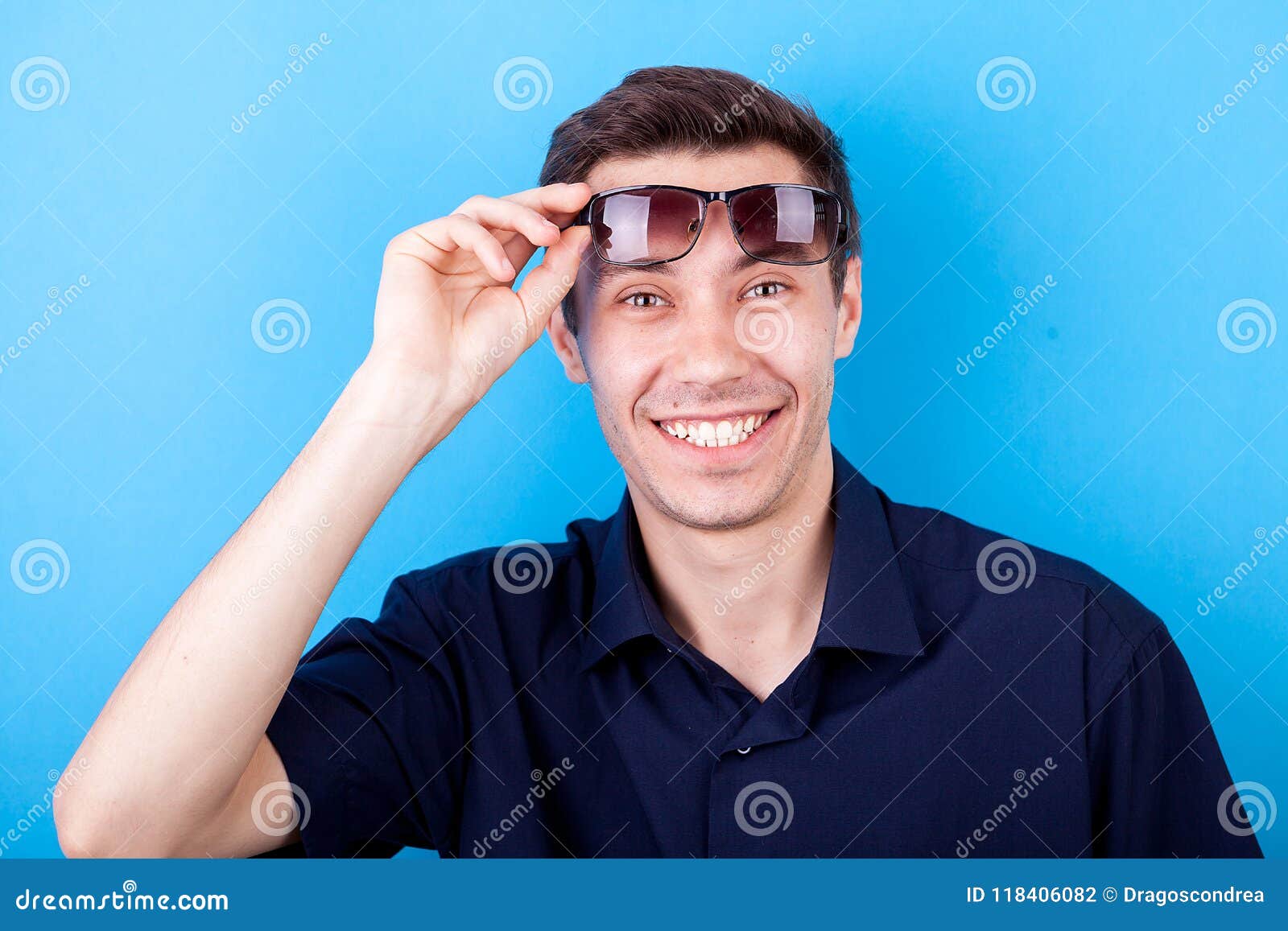 Smiling Young Man Making Silly Faces Stock Photo - Image of caucasian ...