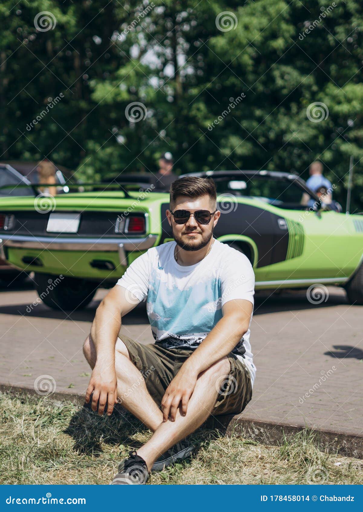 Smiling Man Sitting on Car Background. Great Summer Day Stock Photo - Image  of driver, classic: 178458014