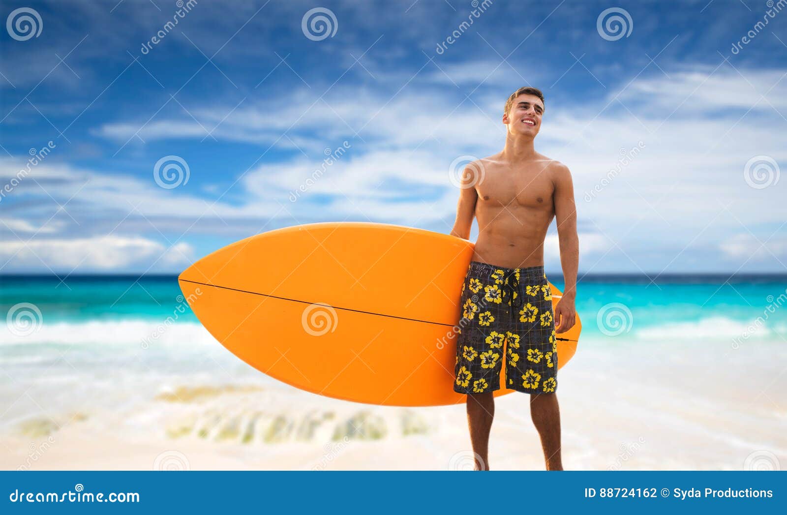 Smiling Young Man With Surfboard On Beach Stock Photo - Image of ...