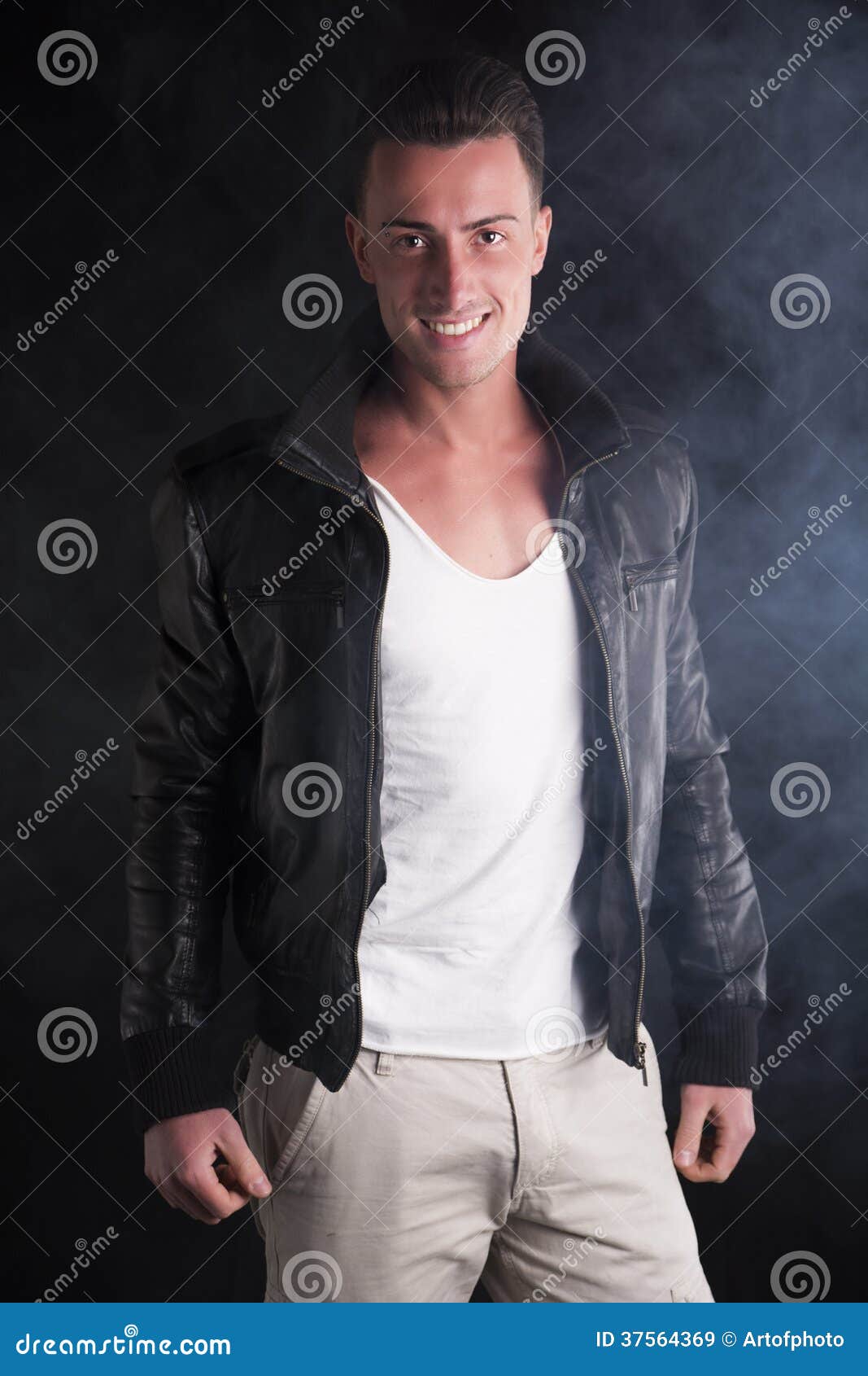Smiling Young Man with White Tshirt and Leather Jacket Stock Image