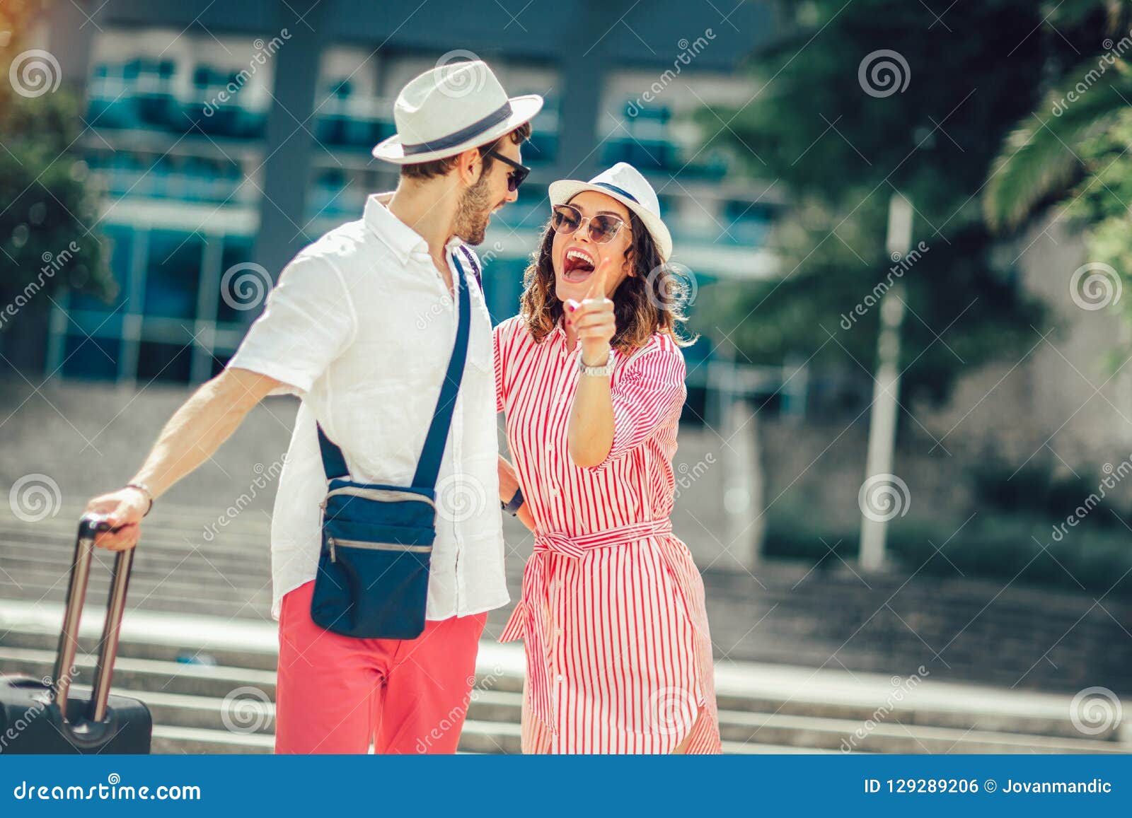 young travellers couple looking for hotel