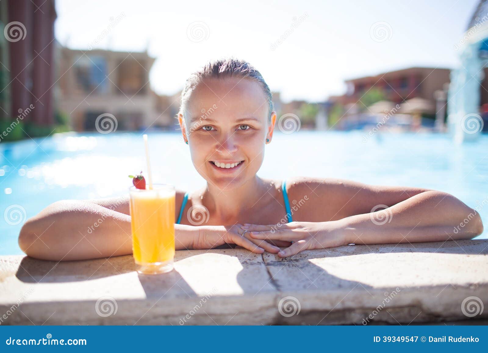 Smiling Young Woman Enjoying A Drink In The Pool Stock Image Image Of