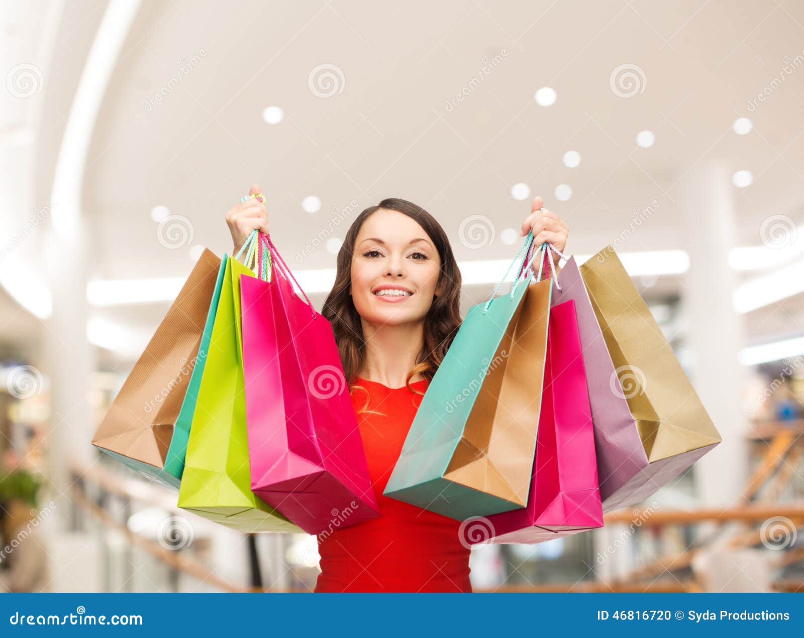 Smiling Young Woman with Shopping Bags Stock Photo - Image of latin ...