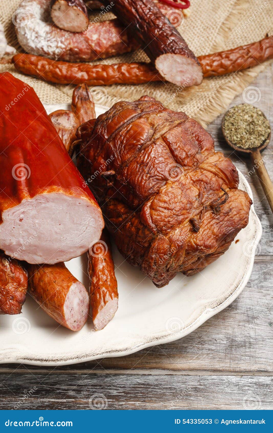 Smoked ham and sausage stock image. Image of sausage 54335053