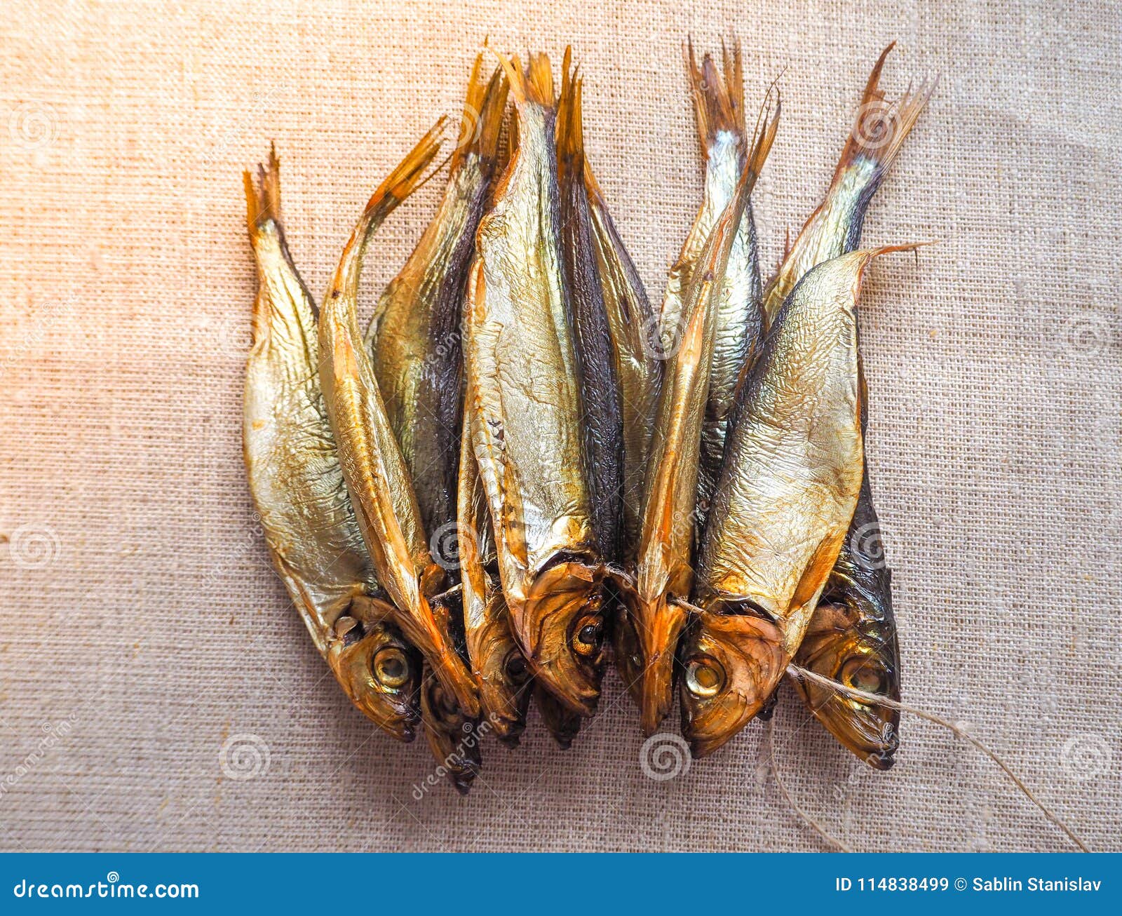 Smoked Herring Fish. Delicious Smoked Fish on the Burlap. Stock Image