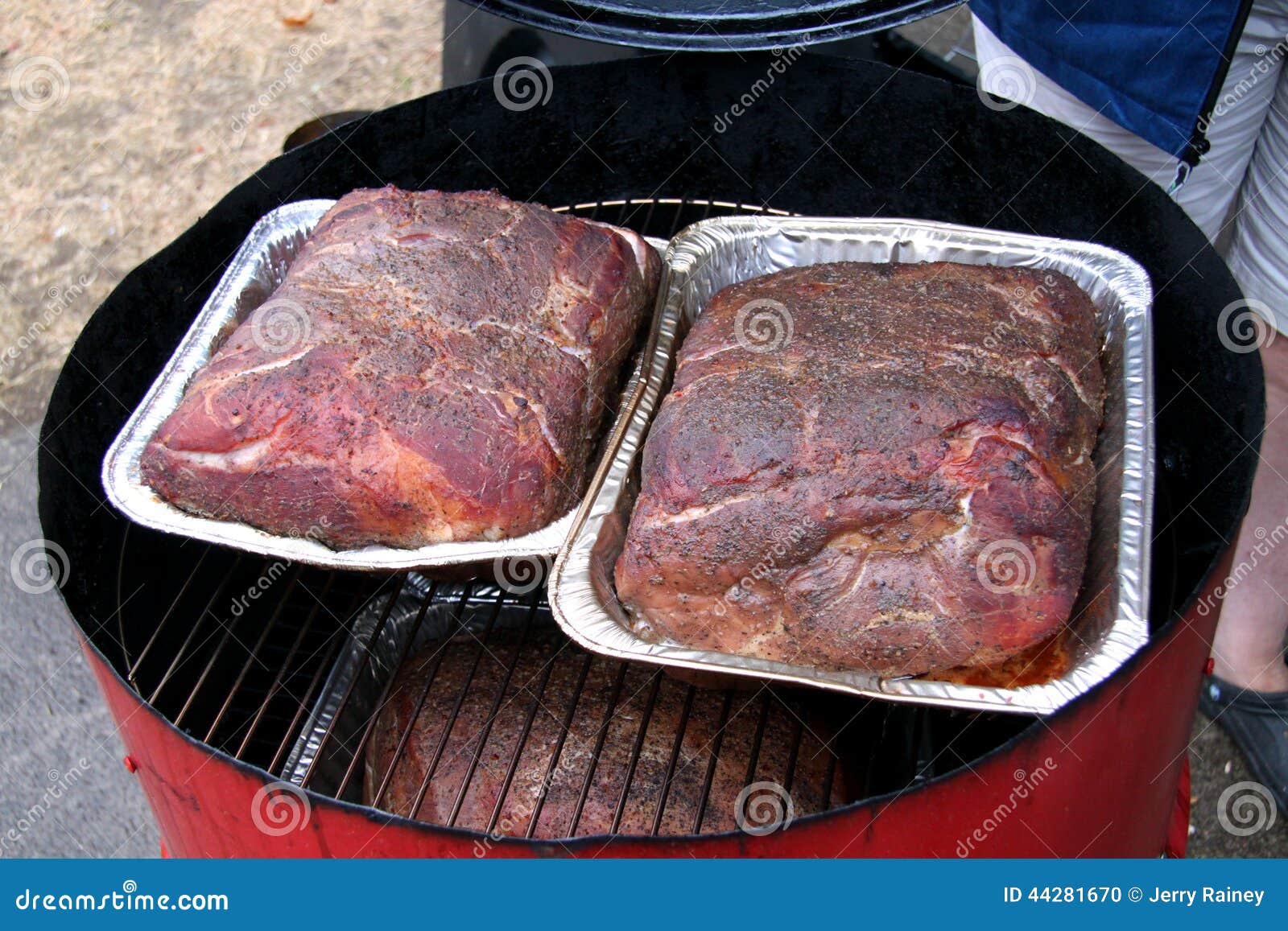 Smoked Roasted Pork Roast for Pulled Pork in the Smoker Stock Photo