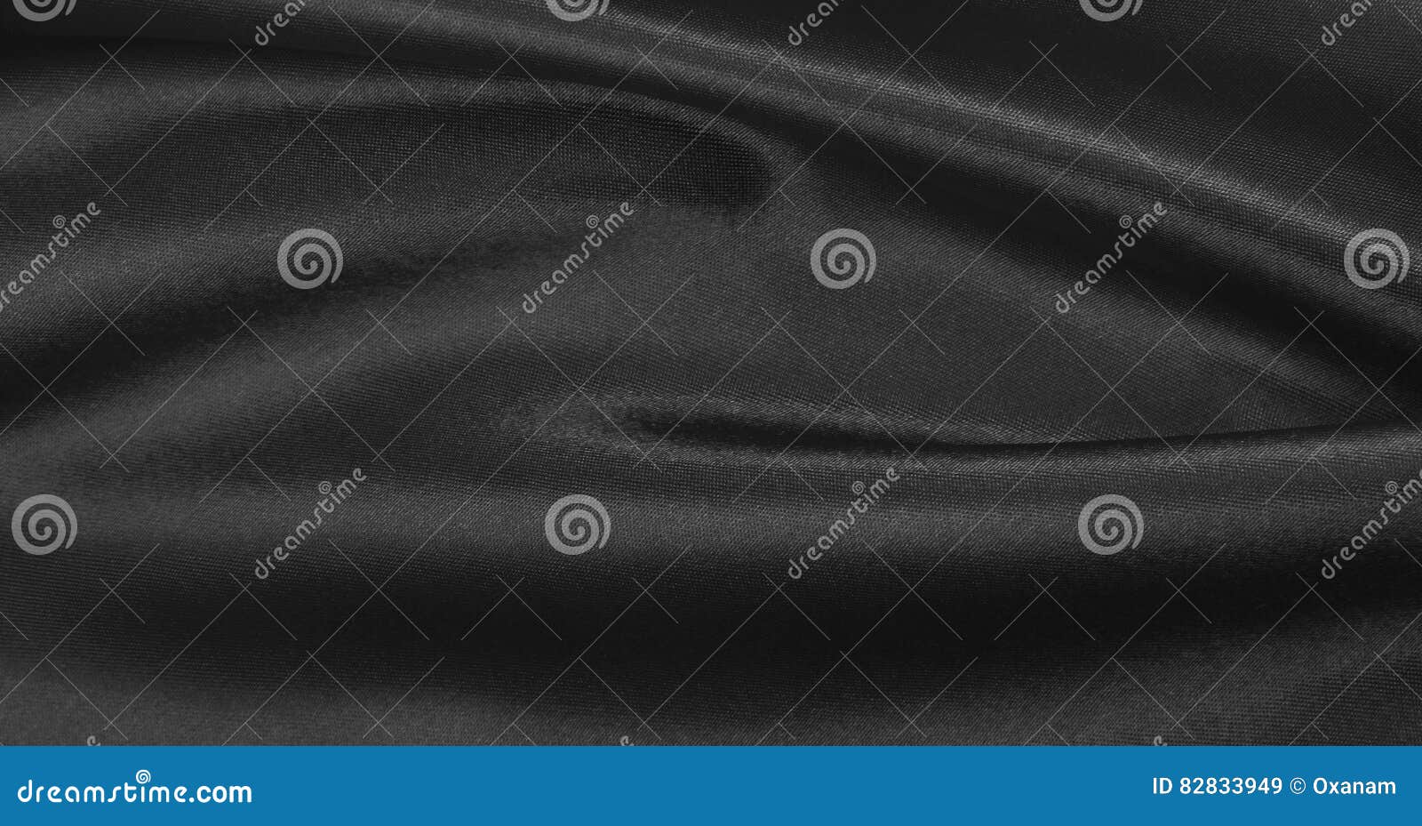 Smooth Elegant Dark Grey Silk or Satin Texture As Abstract Background