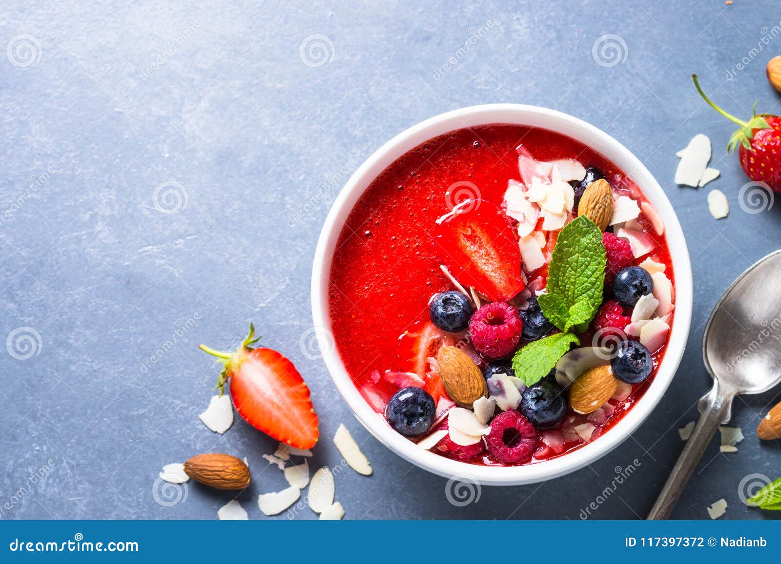 Smoothie Bowl with Fresh Berries and Nuts. Stock Photo Image of