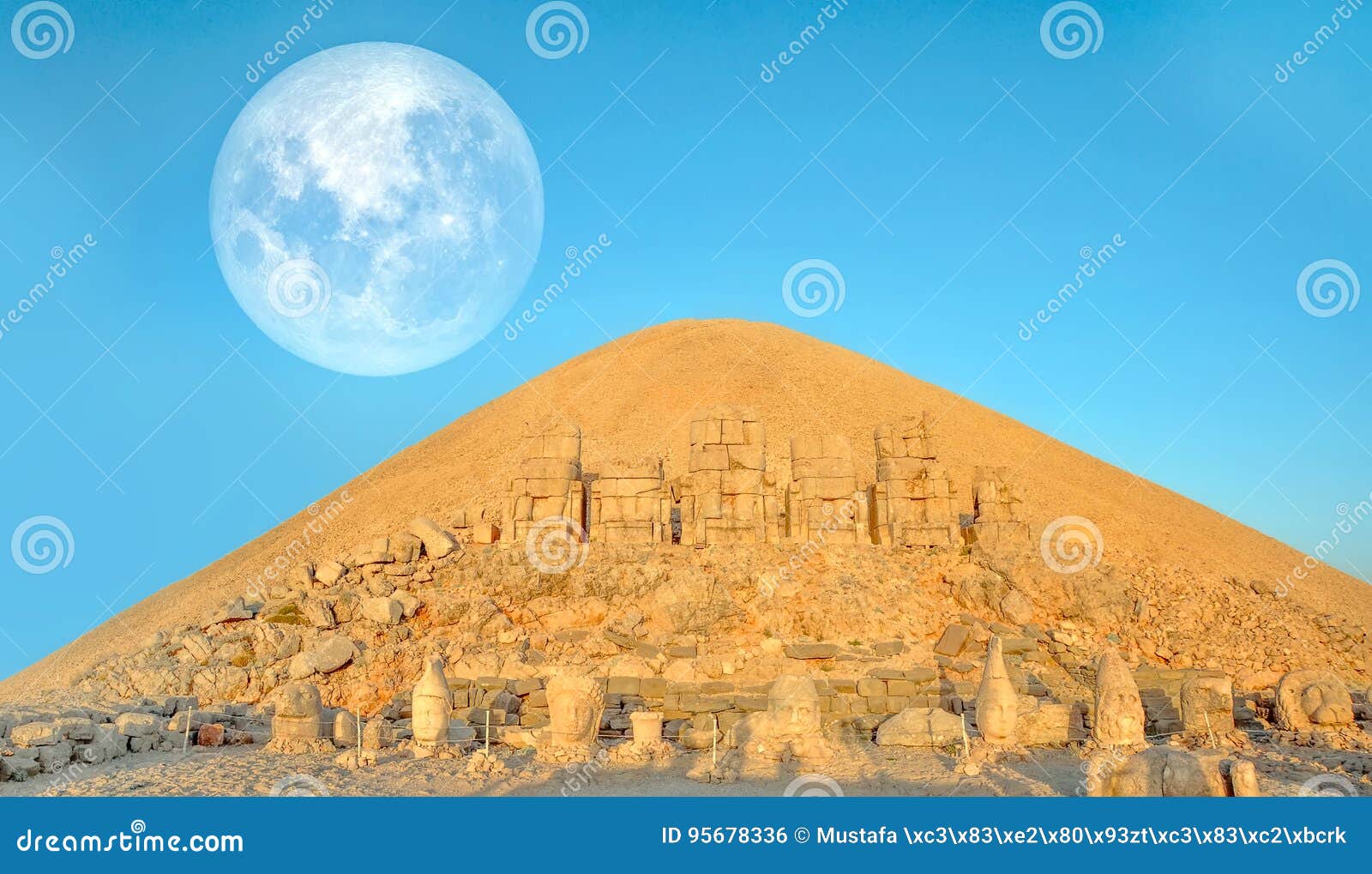 smount nemrut the head in front of the statues. the unesco world heritage site at mount nemrut where king antiochus of commagene i