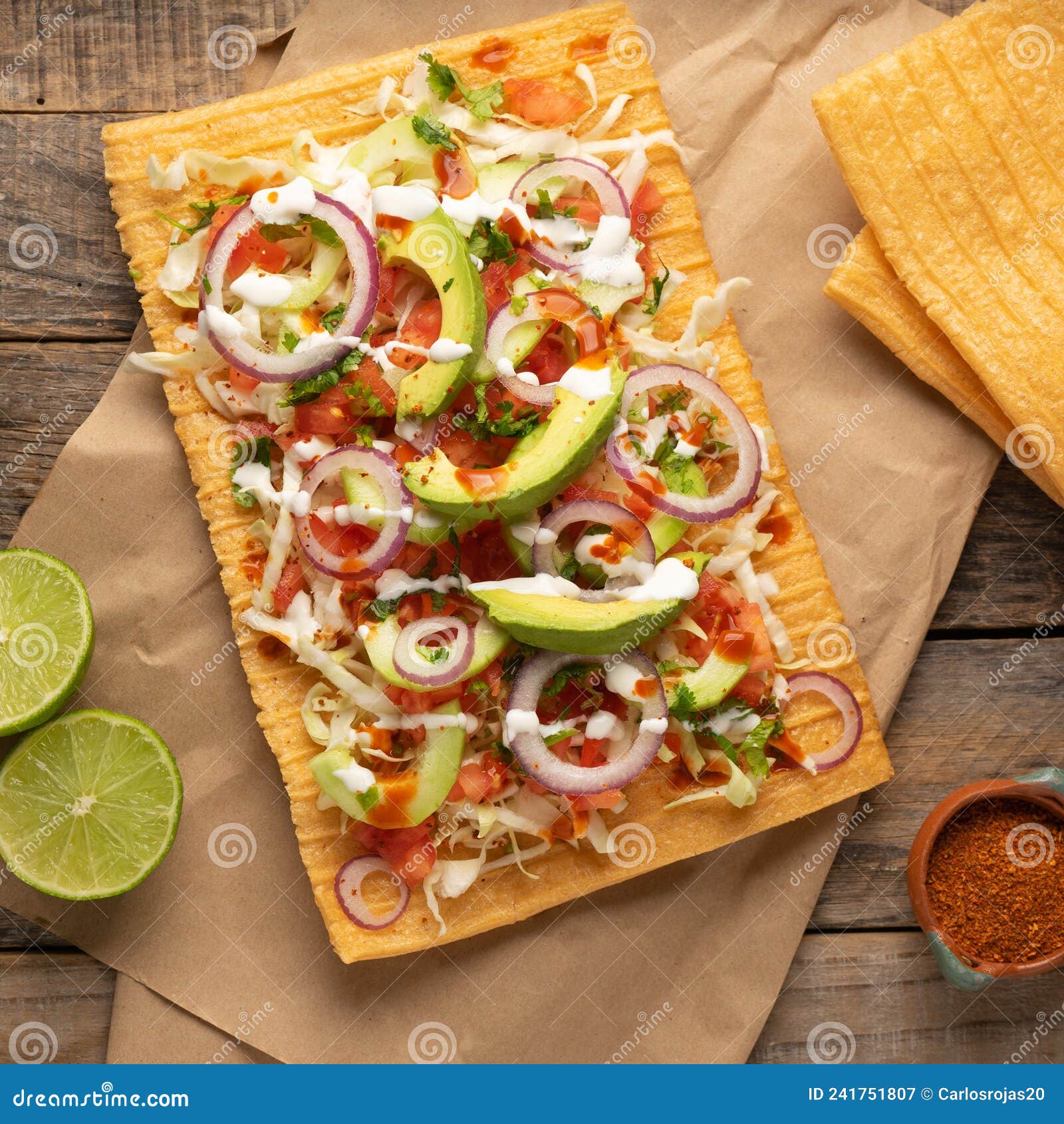 snack made with wheat flour called chicharron preparado with sauce and vegetables. mexican food