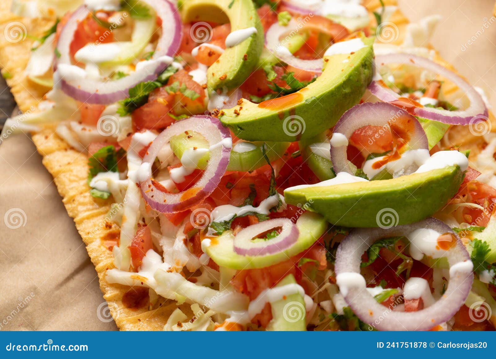 snack made with wheat flour called chicharron preparado with sauce and vegetables. mexican food