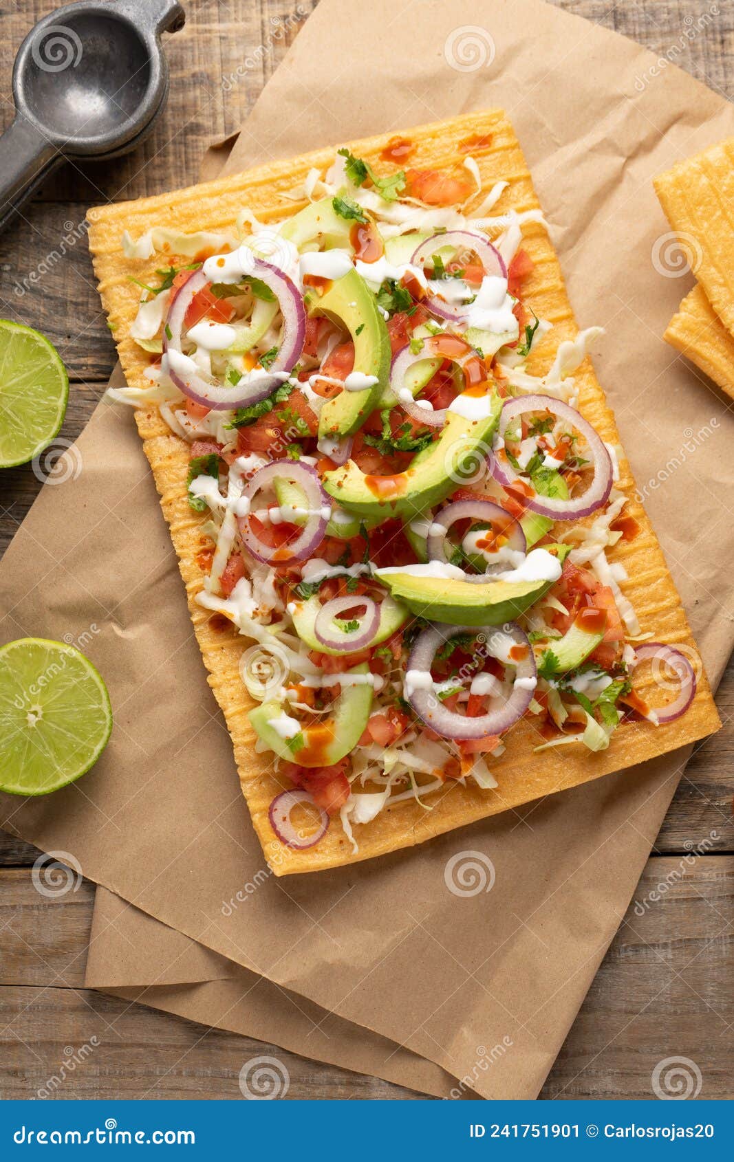 snack made with wheat flour called chicharron preparado with sauce and vegetables. mexican food