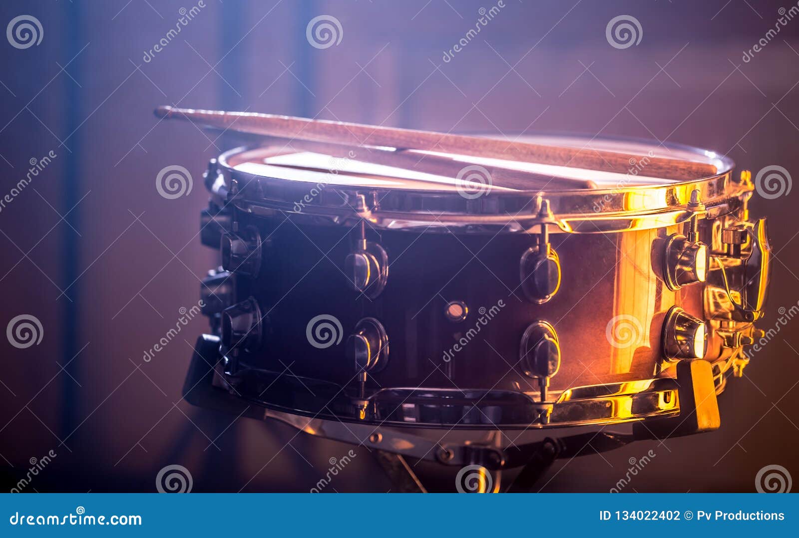 Snare Drum with Sticks on a Beautiful Colored Background Stock Photo