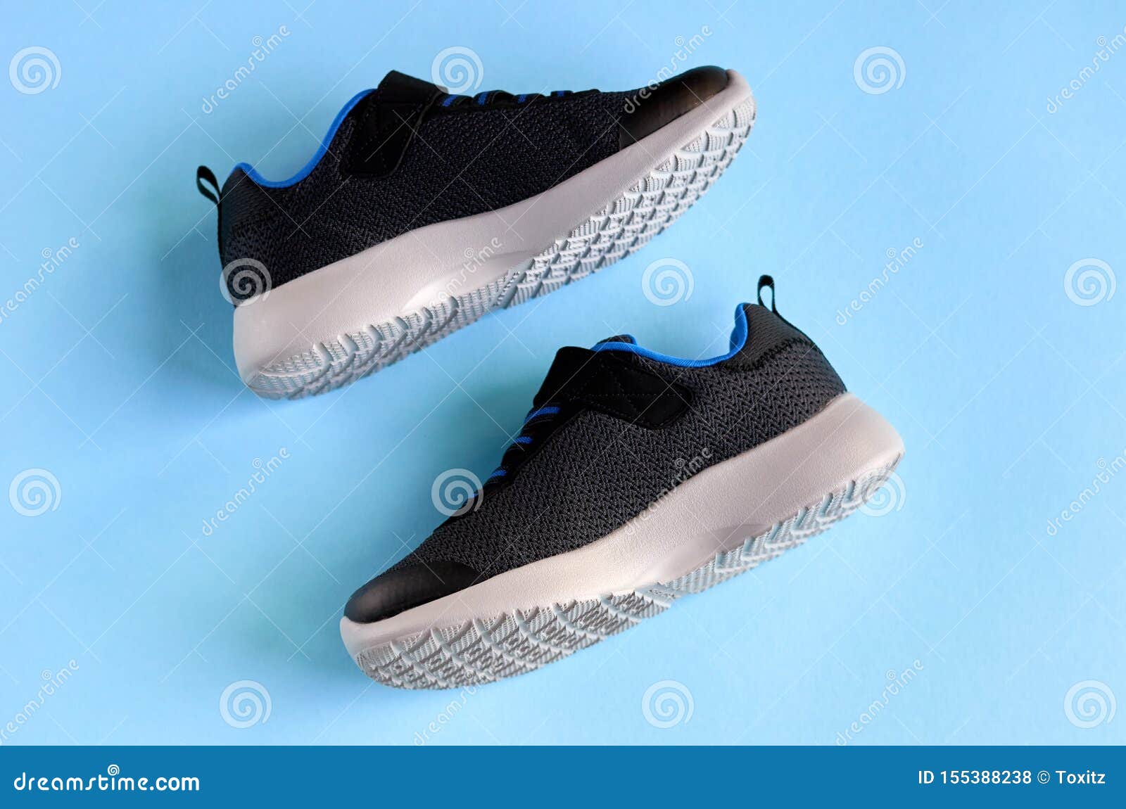 Sneakers on Blue Background Composition, Shoes for Run Stock Photo ...