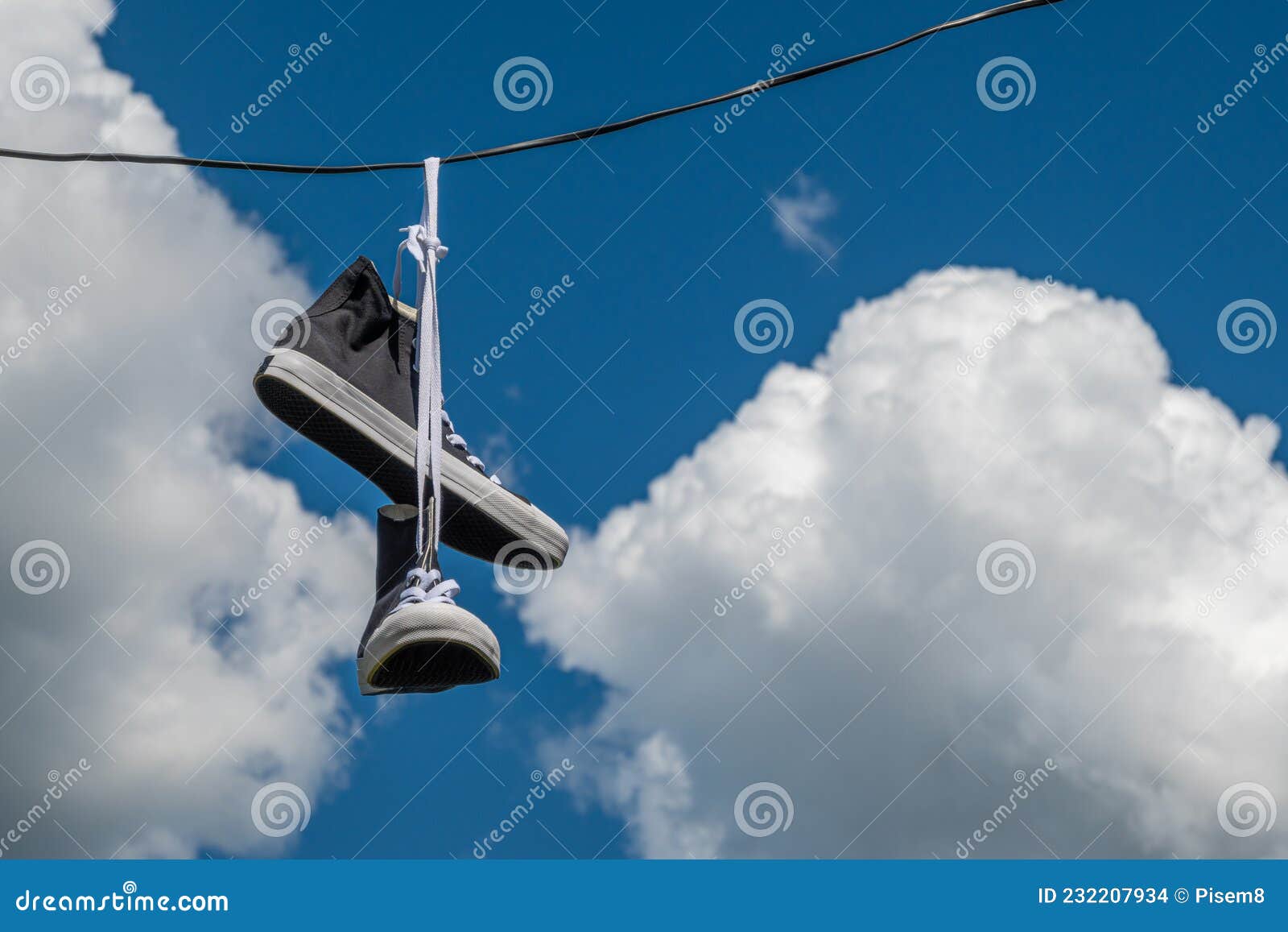 Sneakers hanging on electric wires in rainy weather 29254963 Stock Video at  Vecteezy