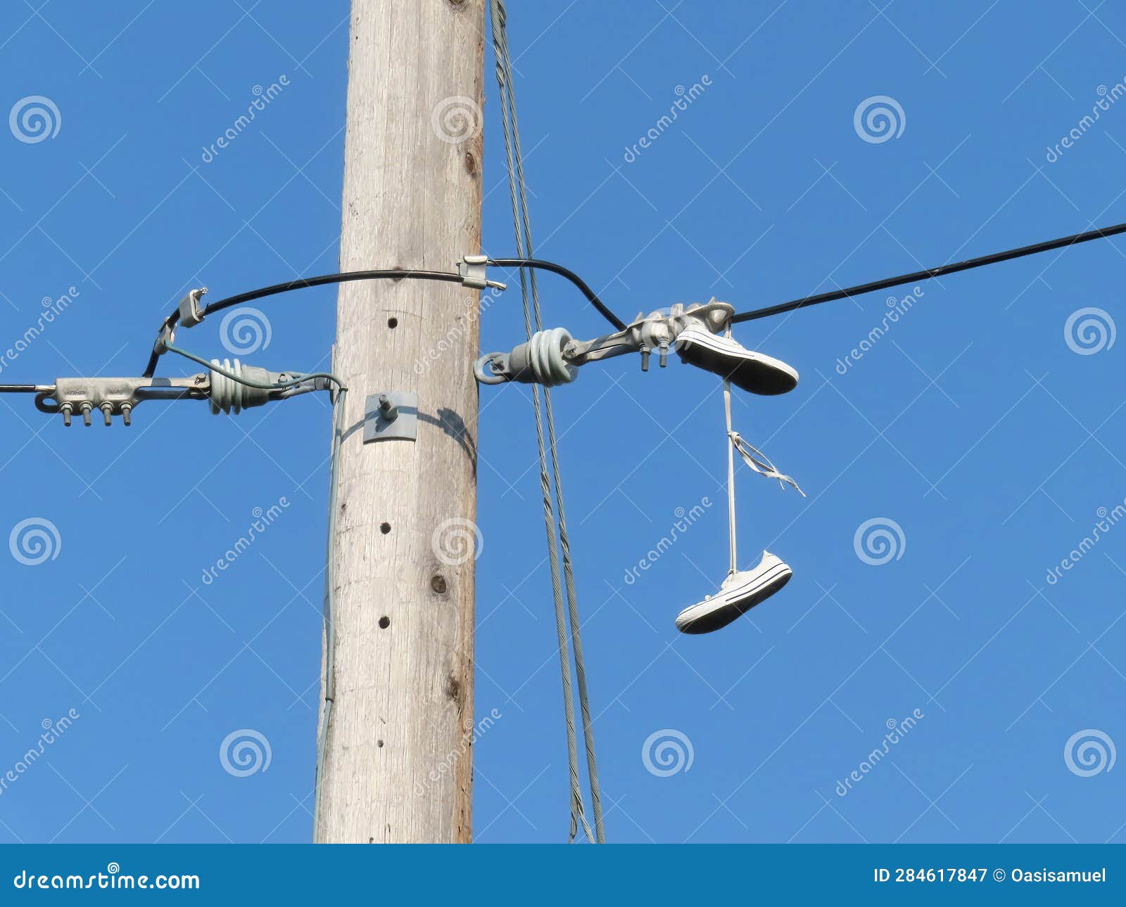 For Find Out Friday - Why Do Sneakers Feel the Need to Dangle From Power  Lines?