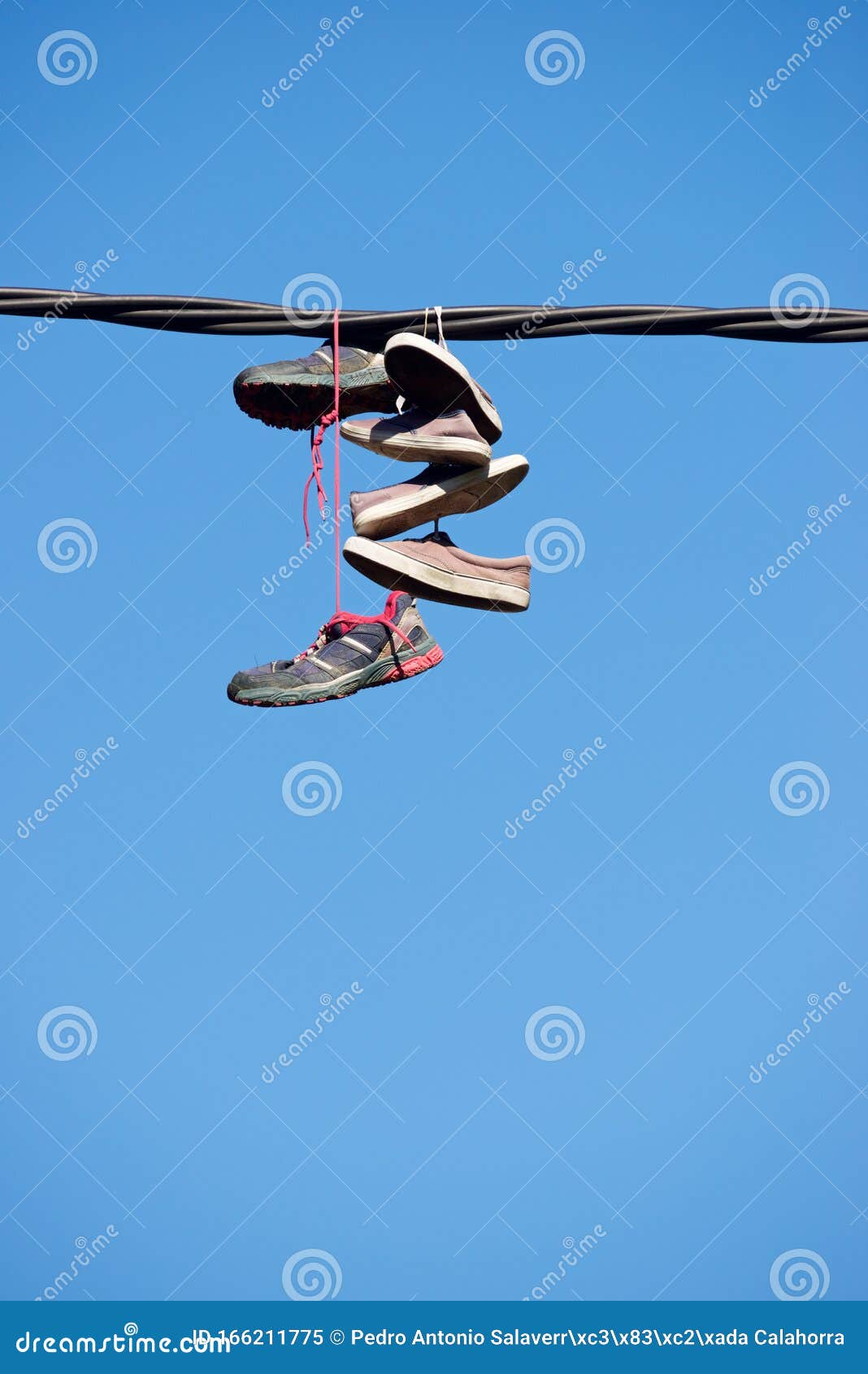 Sneakers hanging view stock image. Image of canvas, lost 166211775
