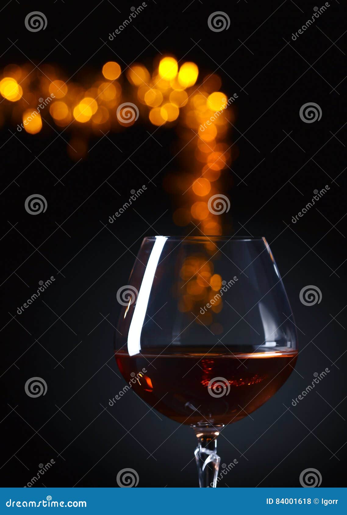 Snifter of brandy stock photo. Image of snifter, black 84001618