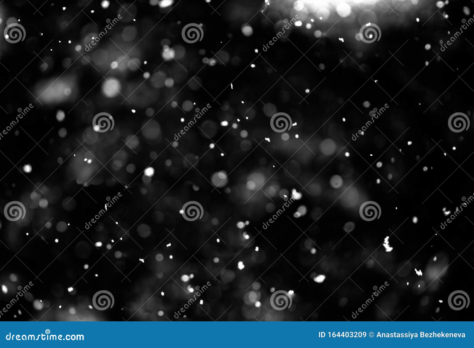 Snow on black background stock image. Image of fall - 164403209