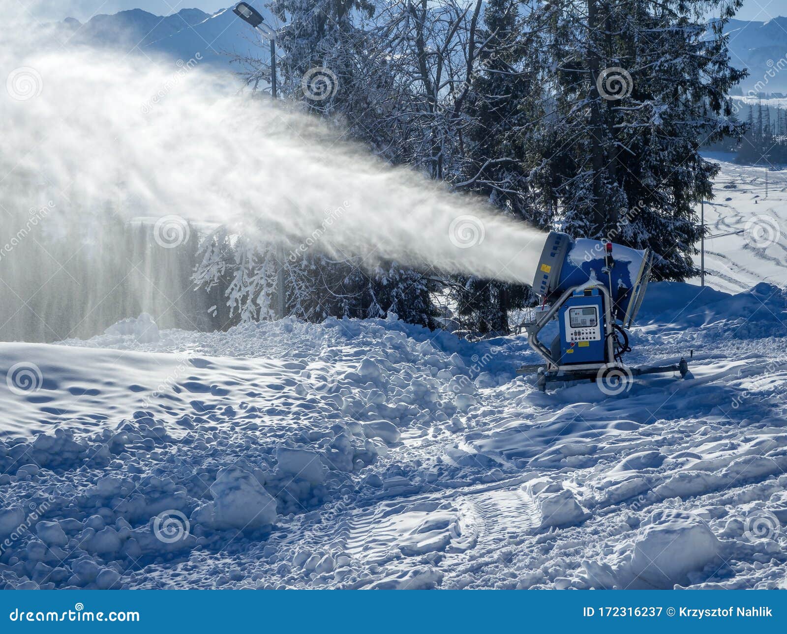 Snow Cannon in action editorial photography. Image of powder