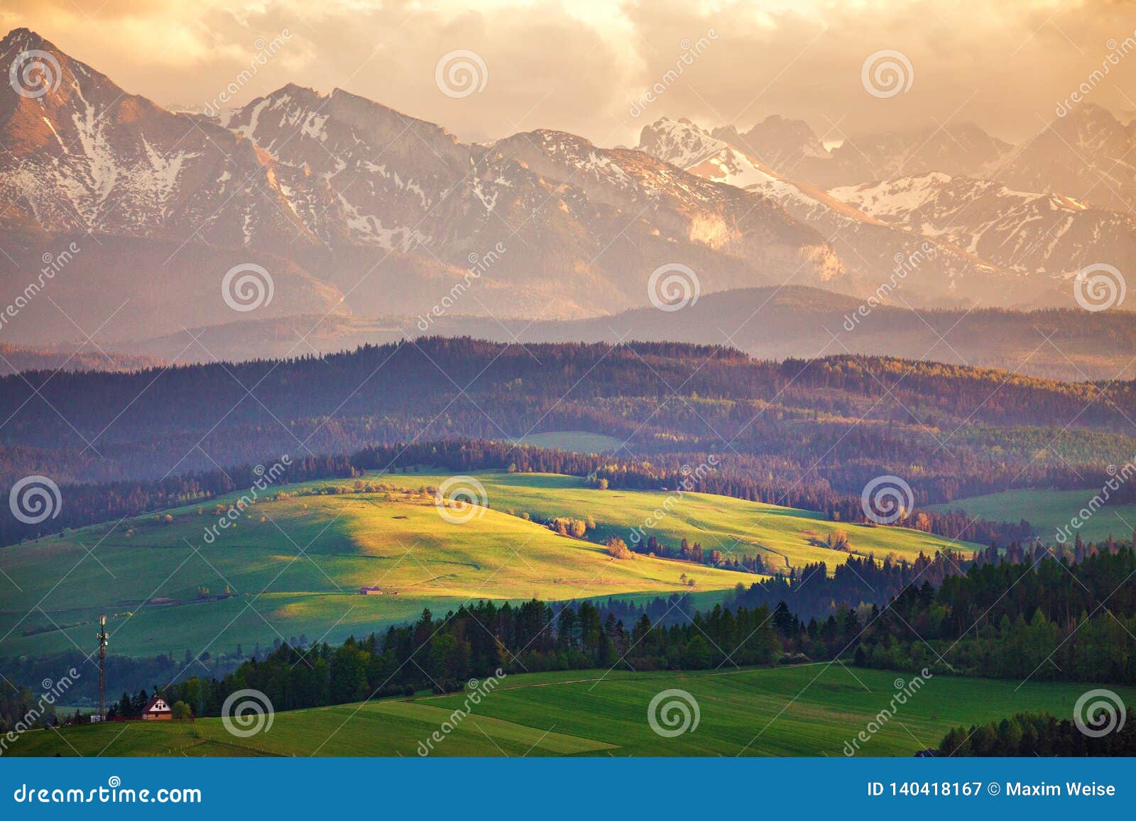 Snow Caped Mountains And Green Fields And Meadows Stock Image Image