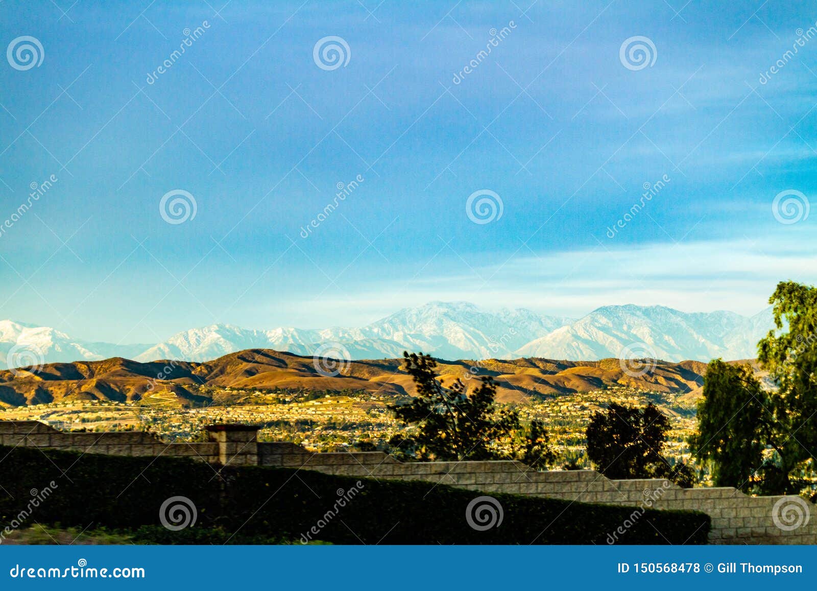 snow capped mountains above the hills of anaheim california